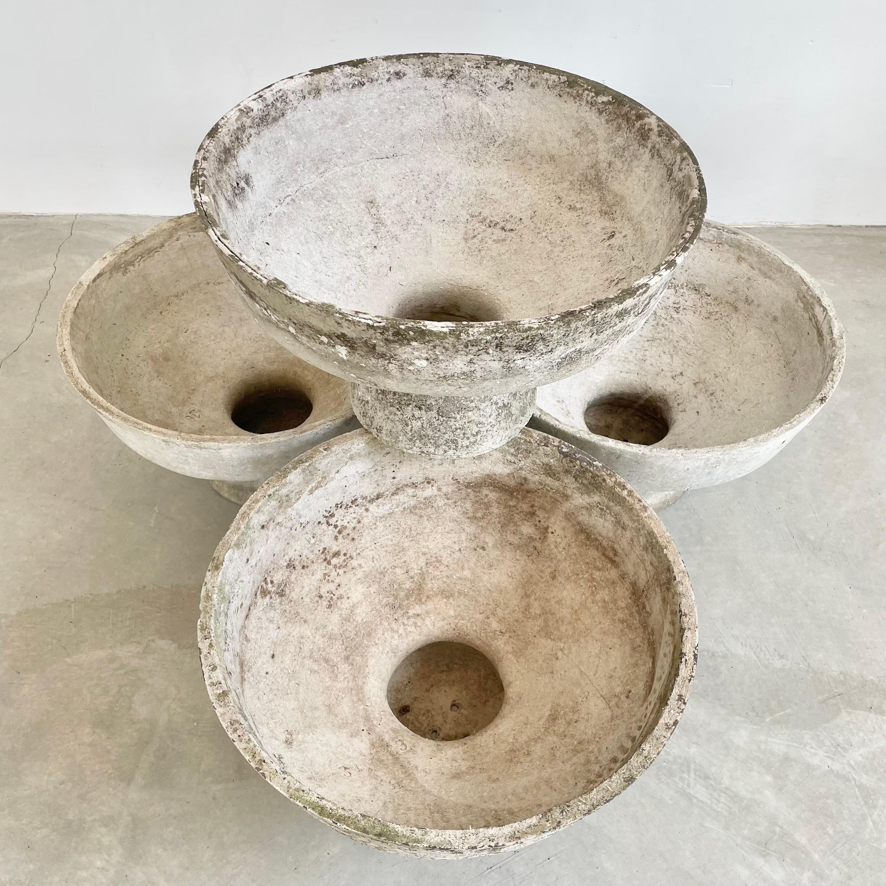 Concrete pedestal planter by Swiss architect Willy Guhl. Made in the 1960s in Switzerland. Factory drilled drainage holes in each planter. Different patina to each planter. Perfect for a foyer or dining table. Great indoors or outside. 5 available.
