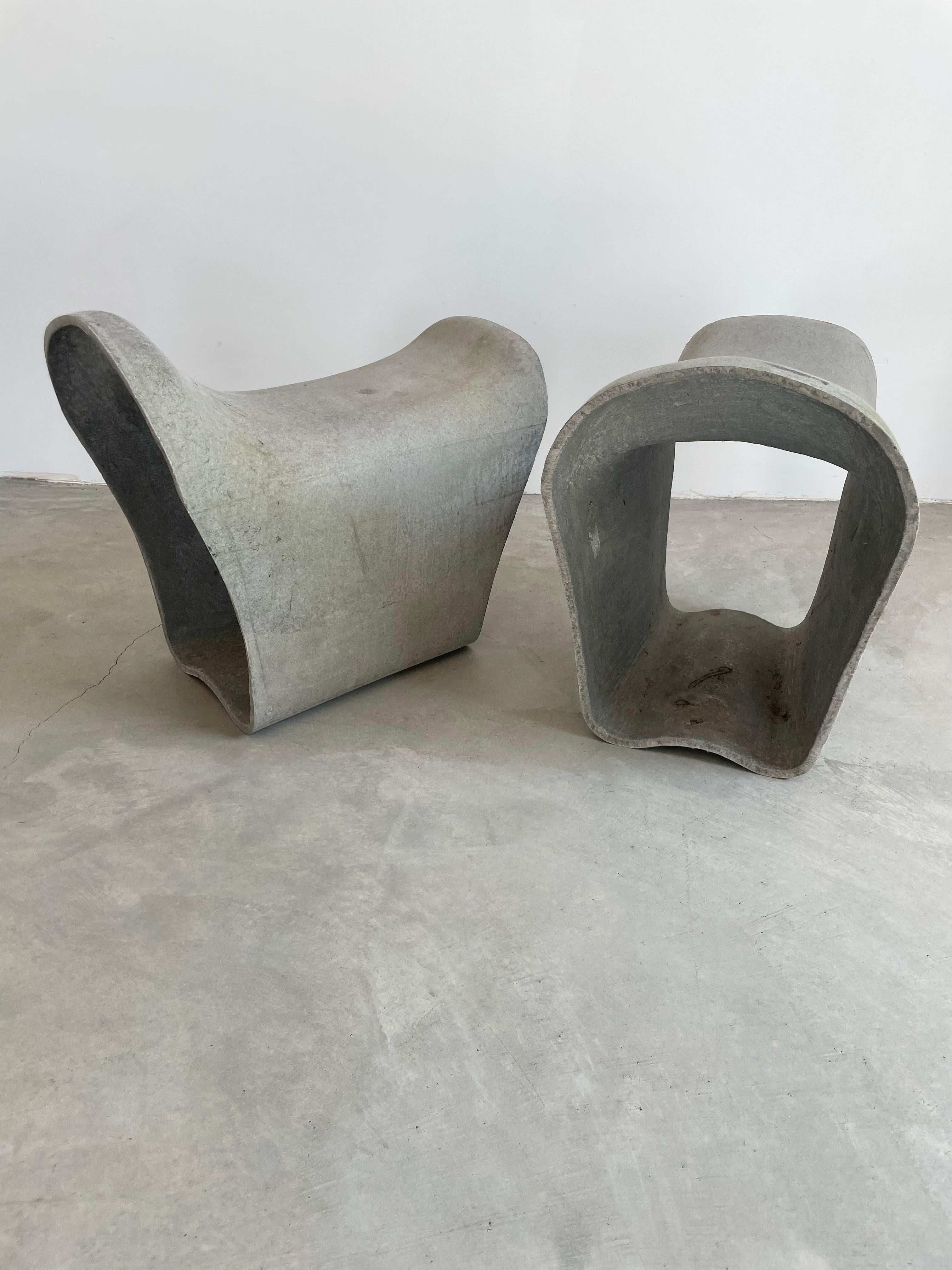 Rare concrete stool by Willy Guhl in the shape of a saddle. Hand-made in Switzerland in the 1960s, Excellent condition and design. Great sculptural pieces with beautiful soft lines. Surprisingly comfortable. Perfect for indoors or outside. Only one