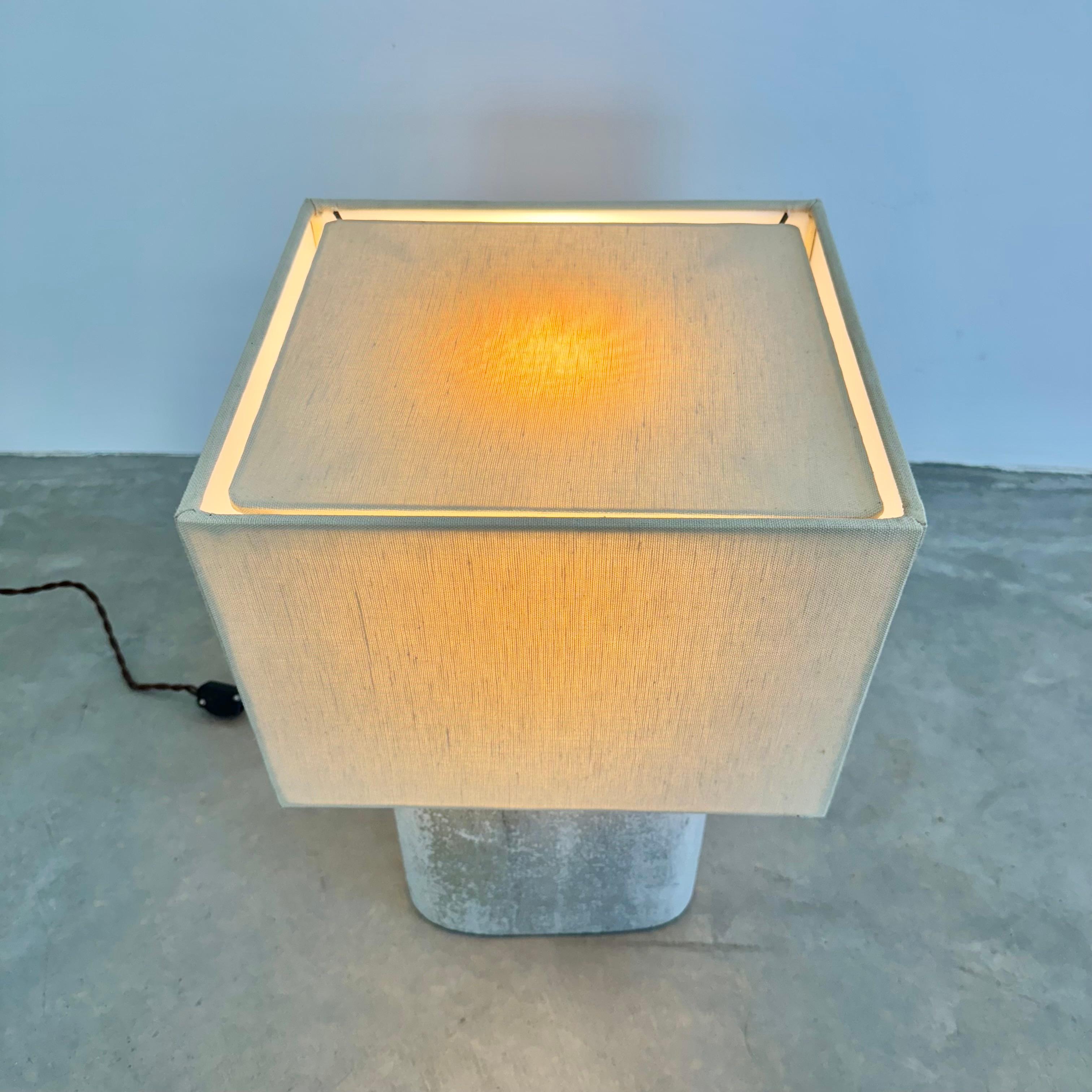 Stunning concrete Willy Guhl lamp by Eternit with teak top cover. Concrete made in Swizterland. Newly fitted as a lamp, re-wired with a new custom linen shade and light diffusor on top. Stunning simplicity and beautiful texture make these lamps