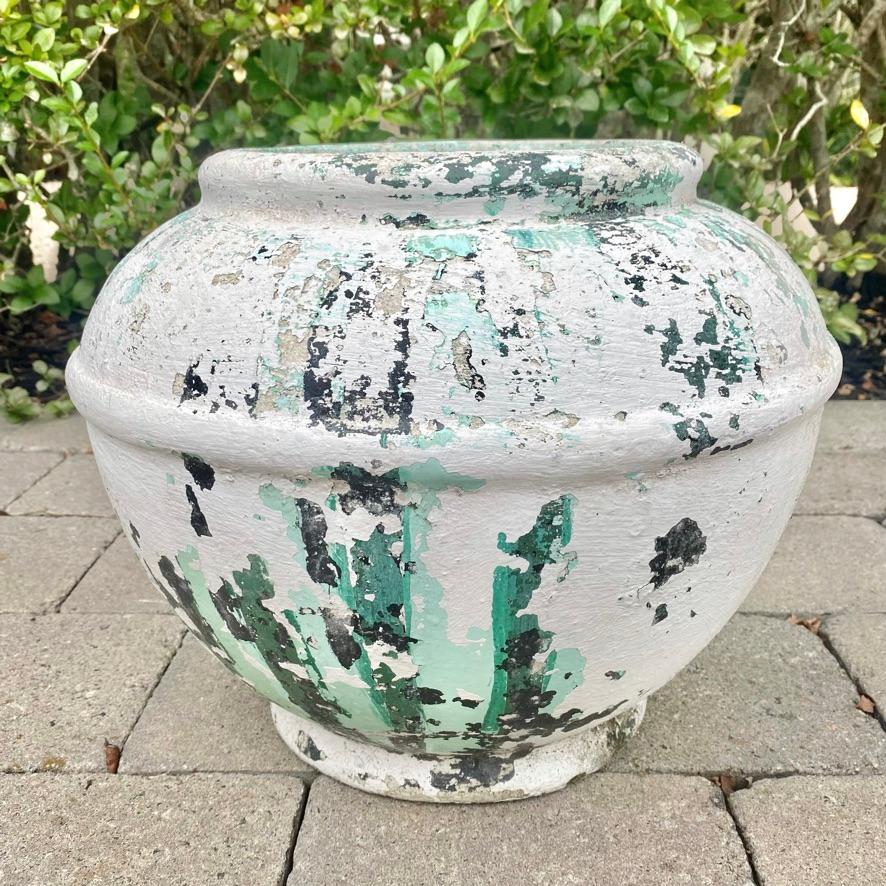 Fantastic concrete vase by Swiss architect Willy Guhl for Eternit. Great tabletop vase or planter in a unique weathered hand painted patina. Very unusual shape. Great indoors or outside. Simple design and very hard to find. Great vintage condition.