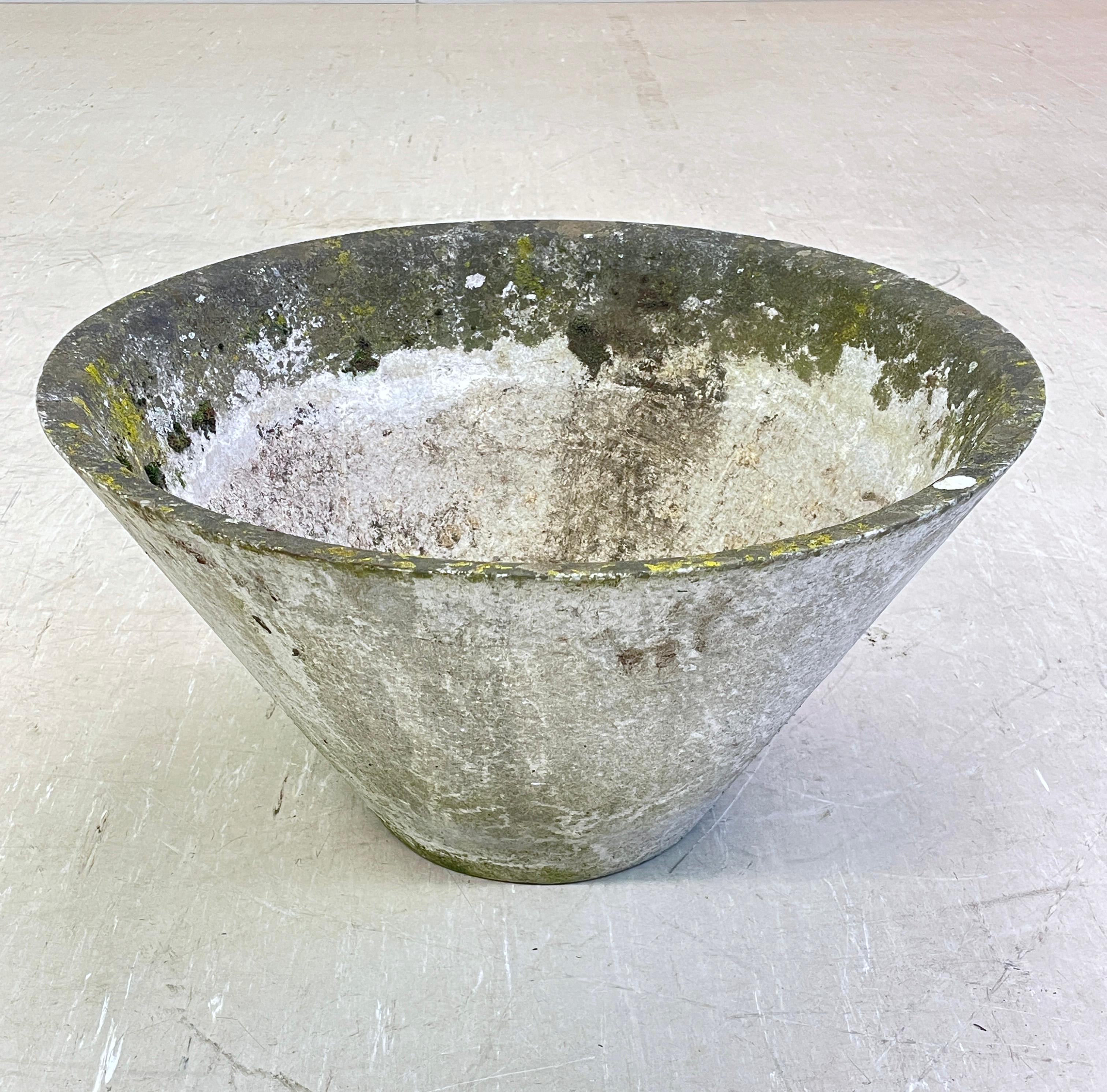 Monumental concrete planter by Swiss furniture designer, Willy Guhl. Solid concrete construction. Made in Switzerland 1960 - 1970. Produced by Eternit AG.  Conical form with drainage holes in base. In original condition with nice patination achieved