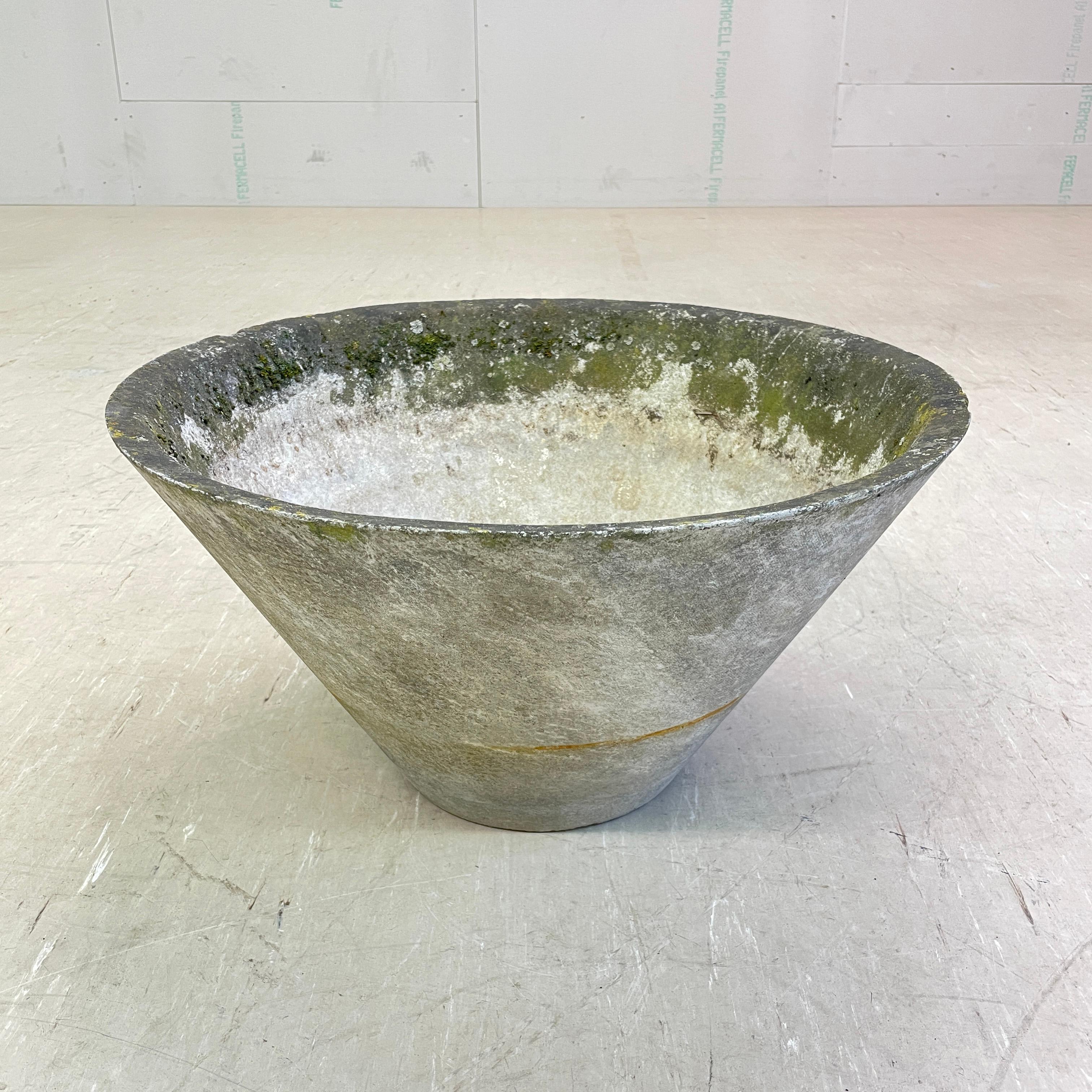 Conical concrete flower pot by Swiss architect and designer, Willy Guhl. Solid concrete made in Switzerland 1960 - 1970. Produced by Eternit AG, Switzerland. Tapered structure with drainage holes. In original condition with beautiful patination