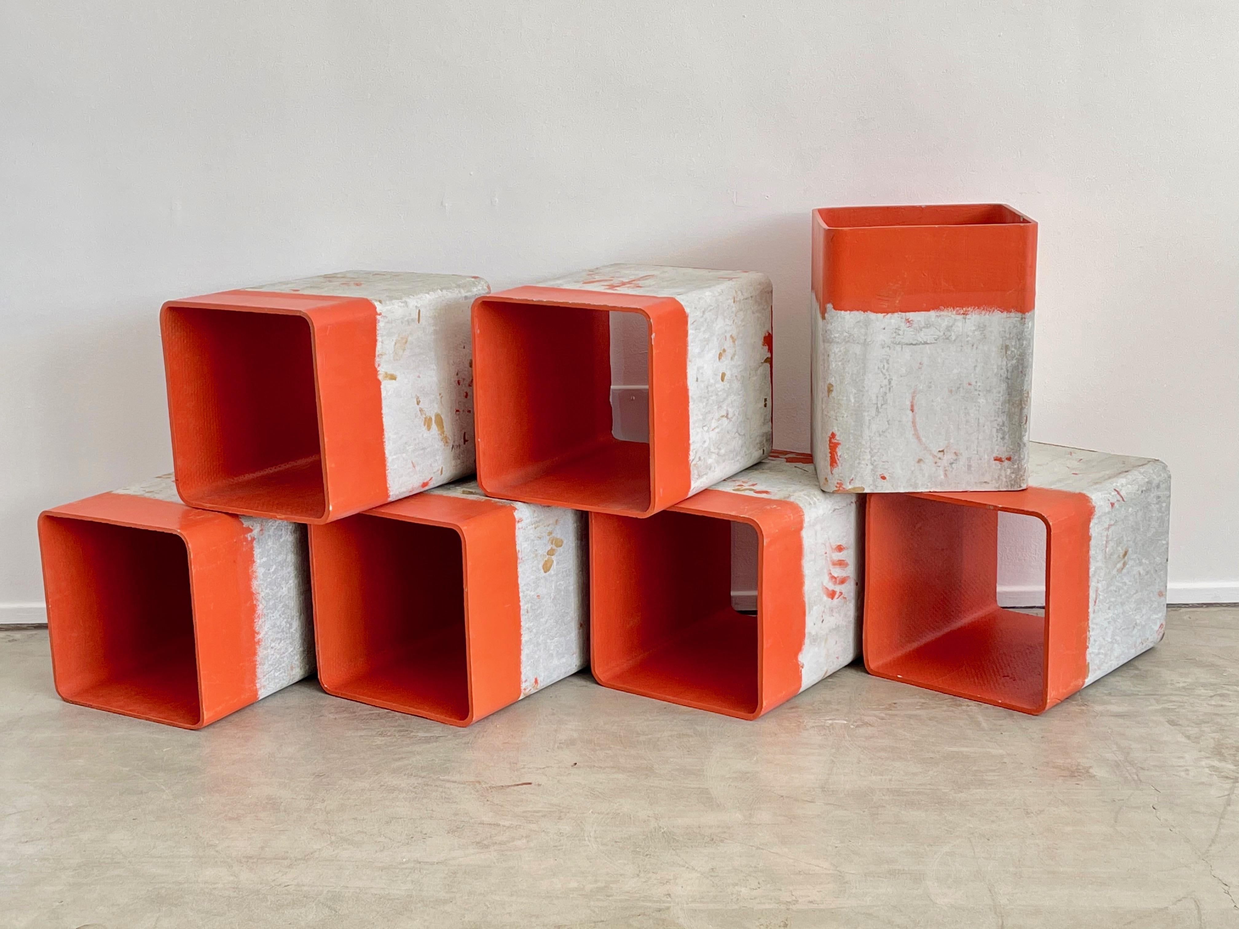 Willy Guhl open cubes customized with bright orange painted interiors
Great as object / bookshelf / or retail display! 




  