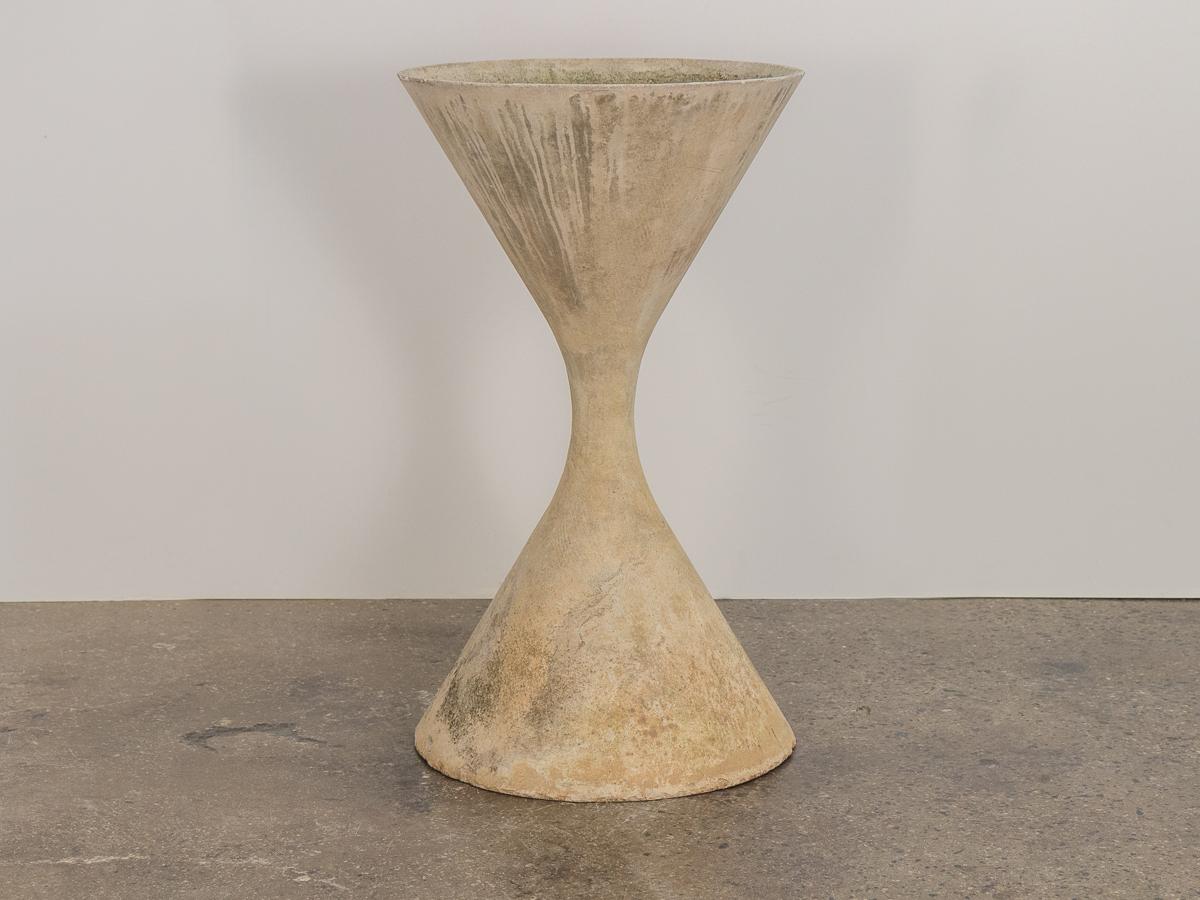 Monumental spindle or Diabolo planter in the largest size, designed by Swiss architect Willy Guh for Eternitl. Standing over 3 feet tall, this large size is scarce outside of Europe. Our example has aged handsomely, with attractive patina and some
