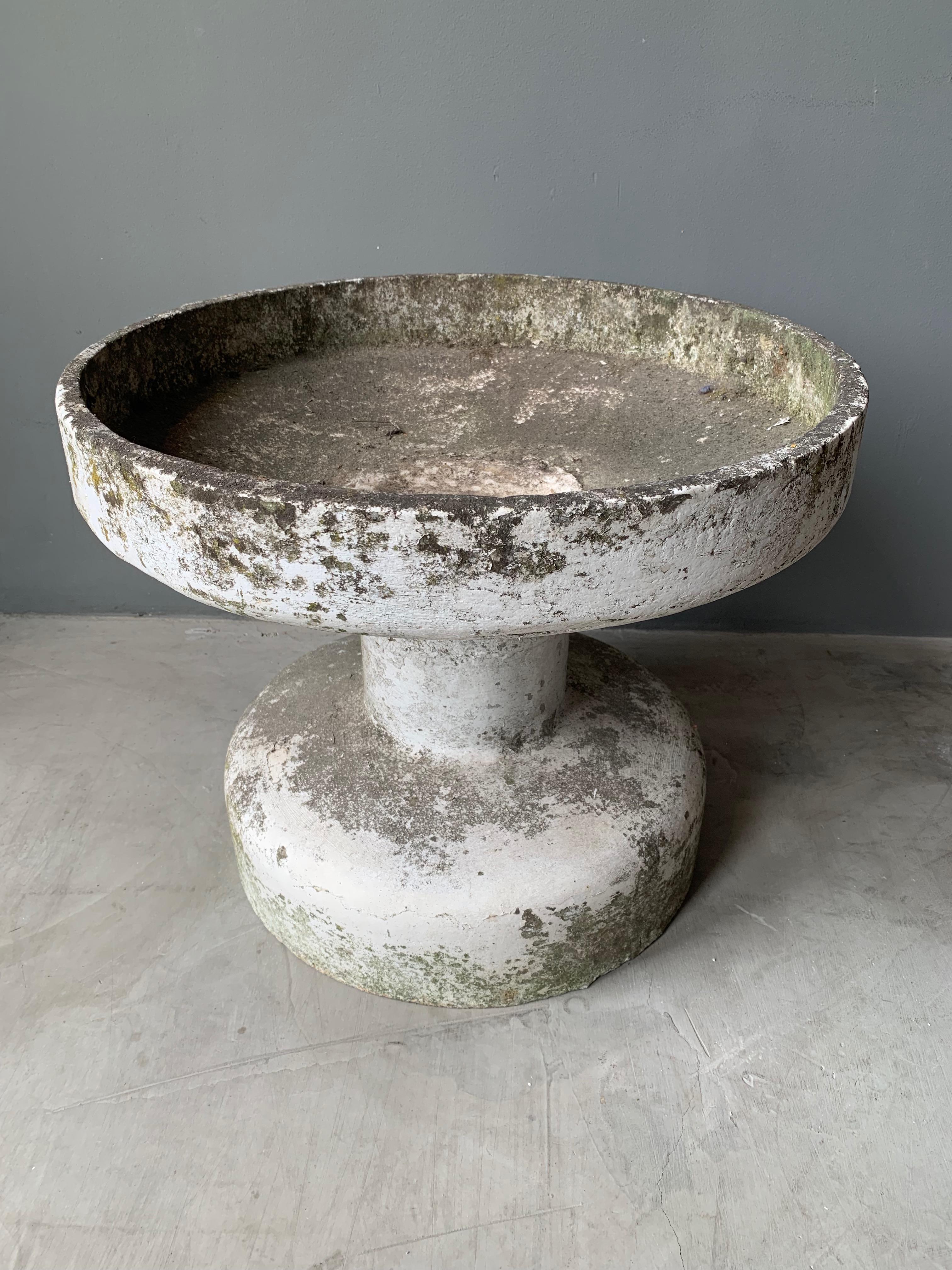 Rare concrete fountain by Willy Guhl for Eternit. Fabricated out of cement. Great sculpture and object. Bowl has factory drilled holes to allow water to pass through. Stunning piece. 

    

   