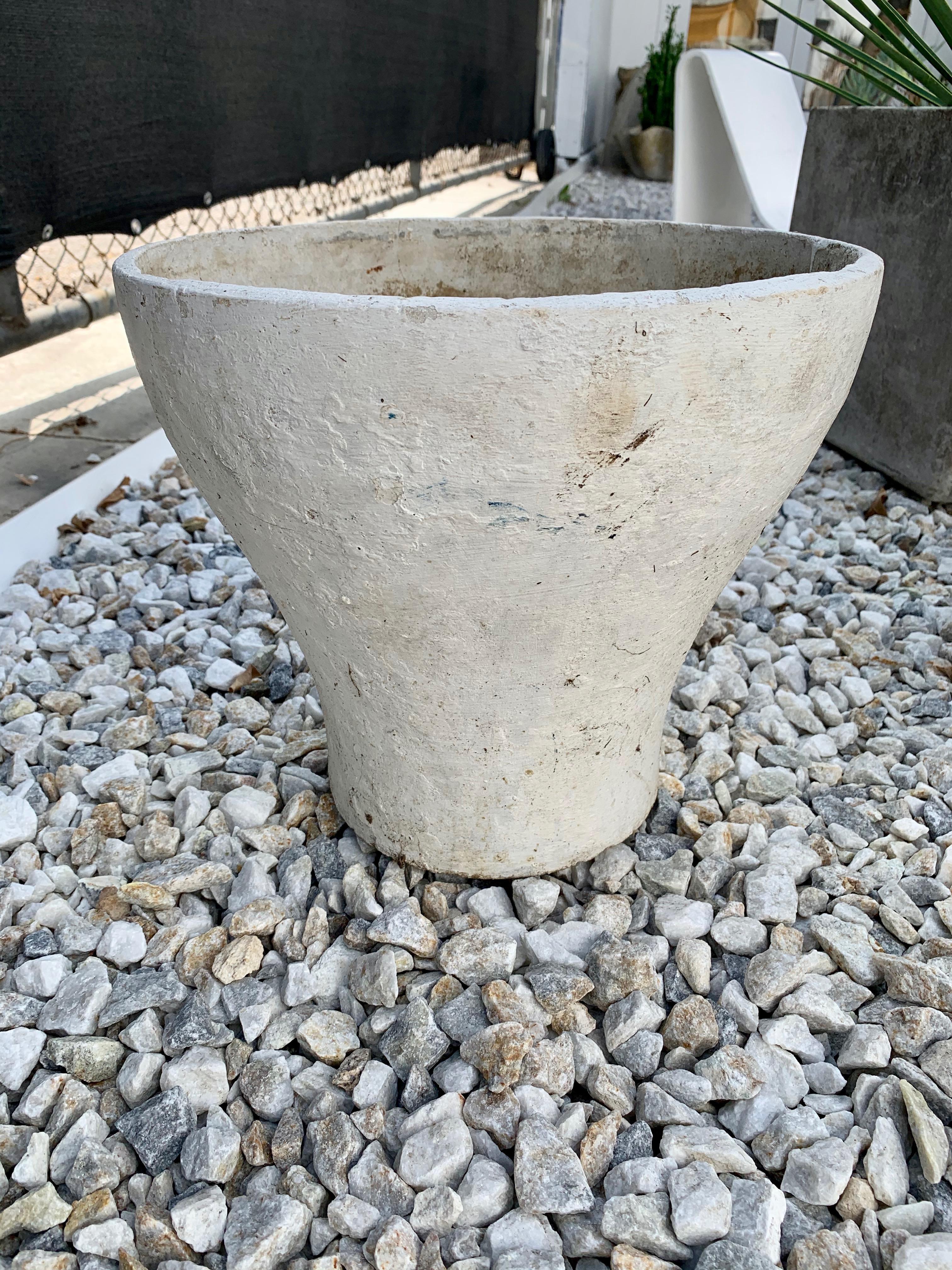 Unique concrete planter by Swiss architect Willy Guhl. Planter in the shape of a goblet or drinking cup. Rare design. Great scale. Only one available.









     