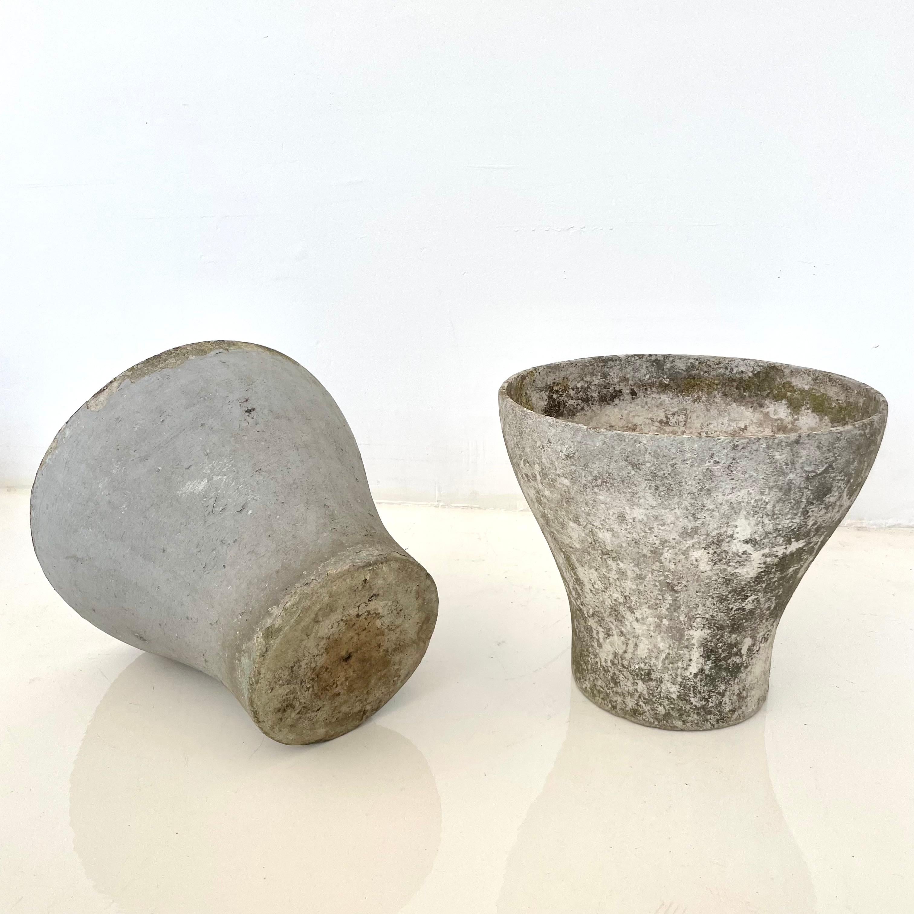 Unique concrete planter by Swiss architect Willy Guhl. Planter in the shape of a goblet or drinking cup. Excellent patina and coloring. Great scale. Two available. Priced individually. 

       






 

