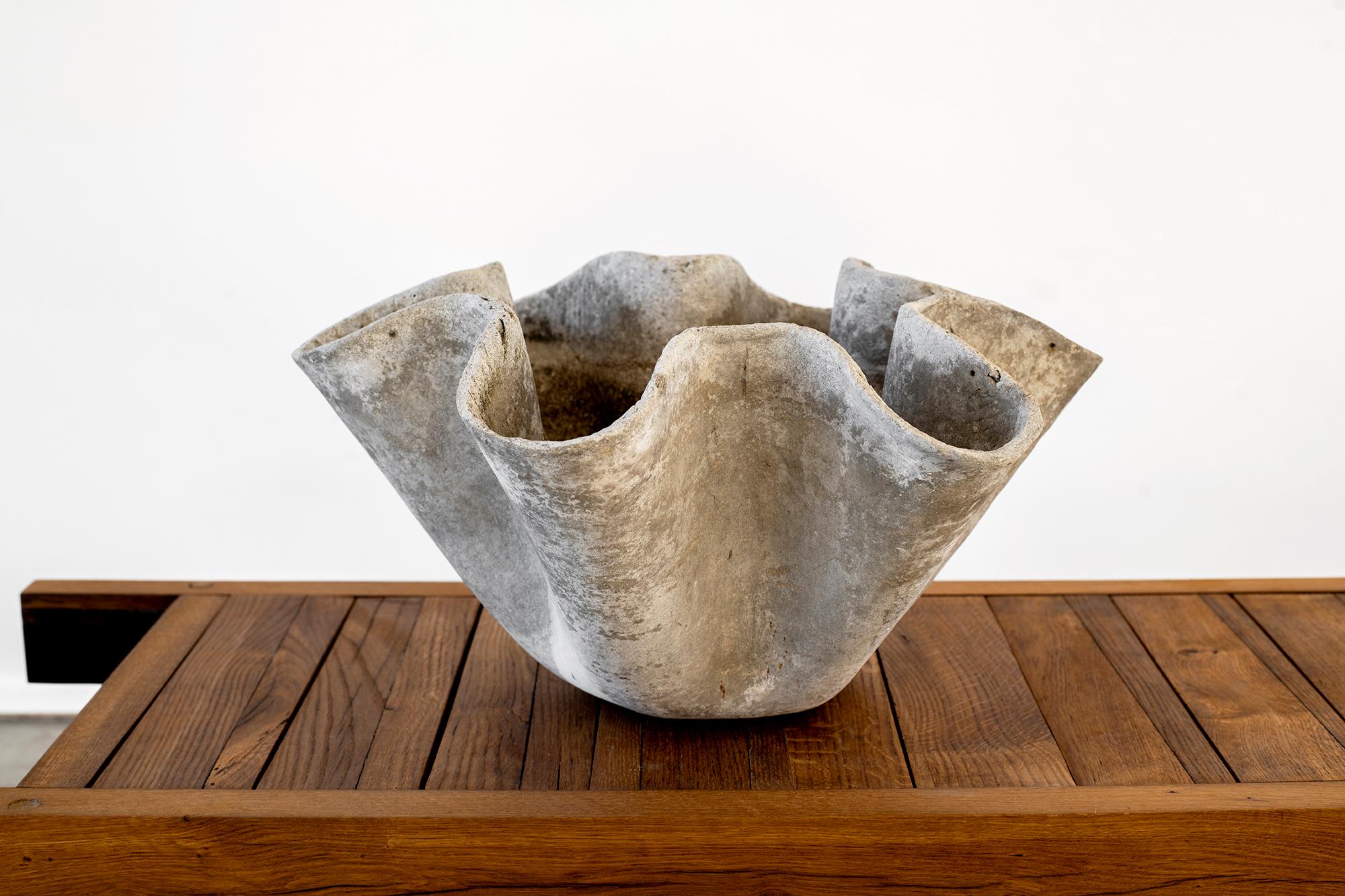 Fantastic biomorphic handkerchief planter by the Swiss Architect, Willy Guhl. 
Wonderful sculptural shape with great age, patina, and coloring.