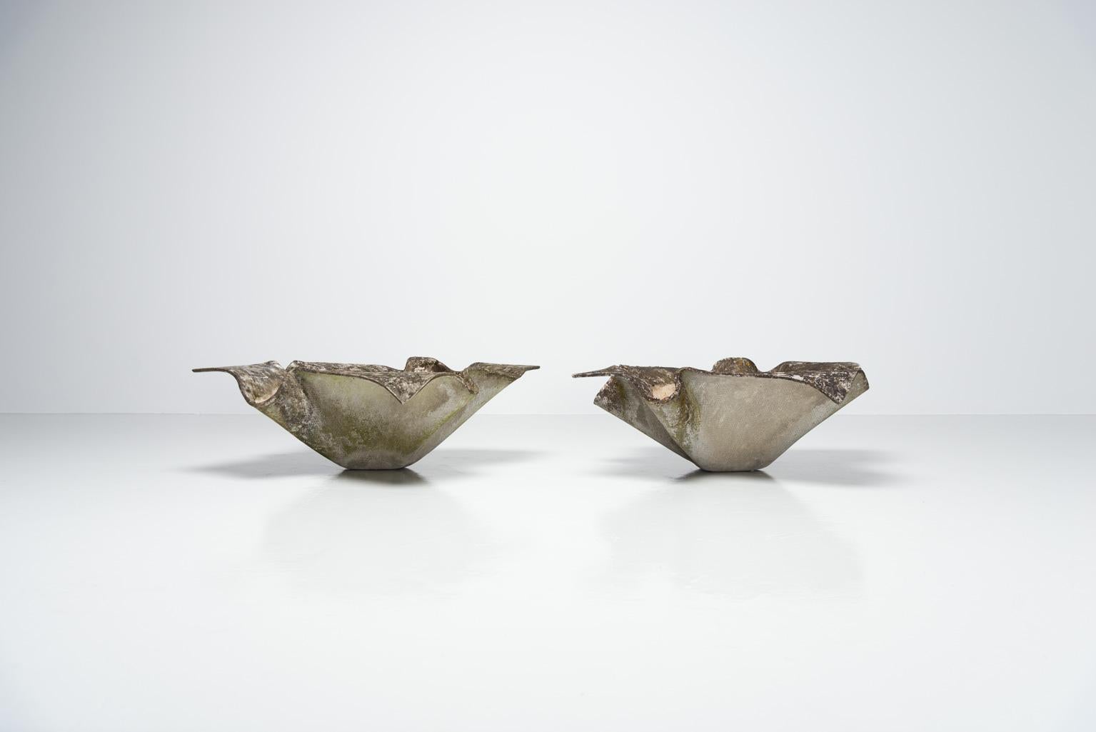 Highly decorative and very large pair of outdoor handkerchief shaped planters designed by Willy Guhl, and manufactured by Eternit AG, Switzerland 1960. These planters are made of cellulose infused fiber cement. They have a fantastic patina from
