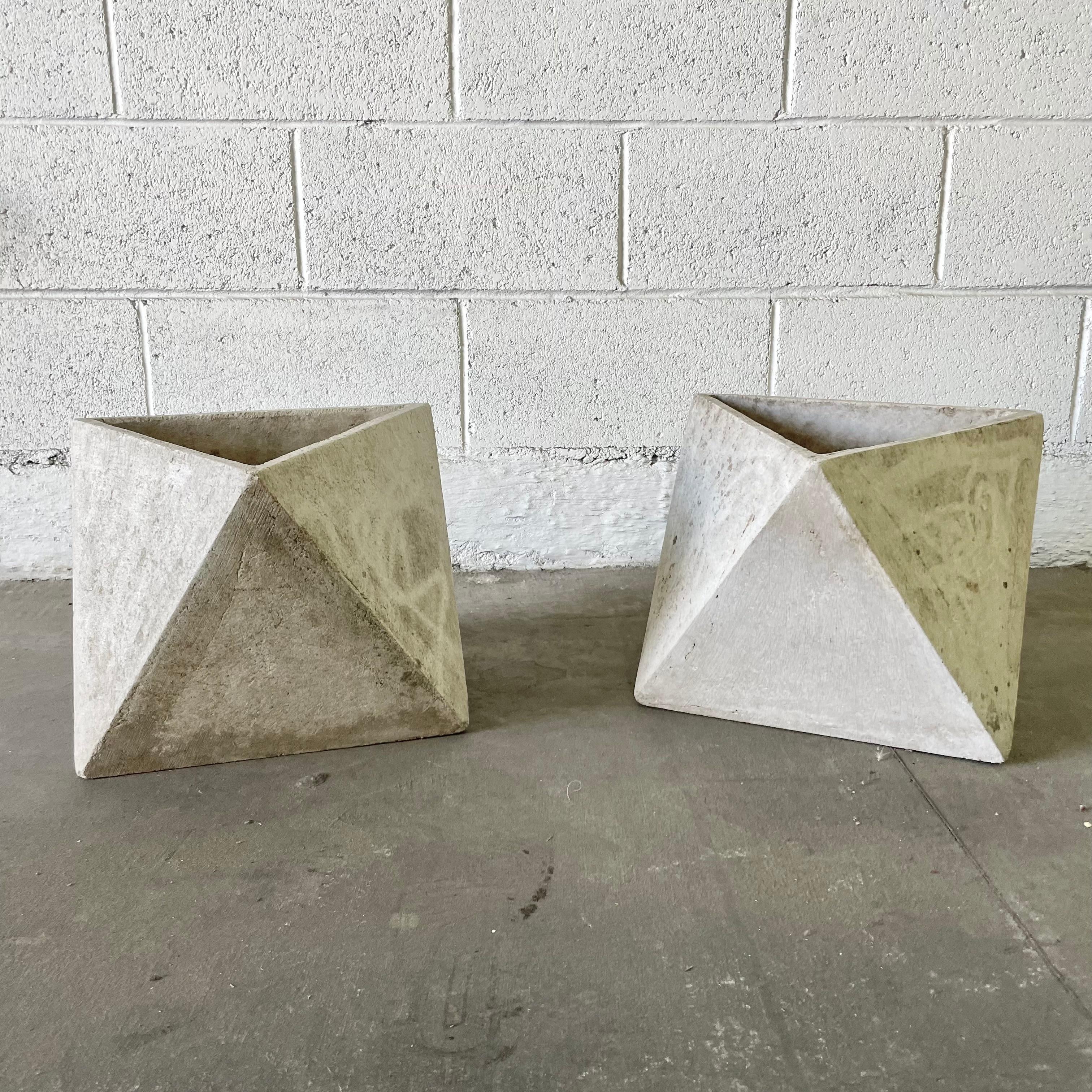 Unique triangular concrete planter by Swiss Architect Willy Guhl. Different sides of the planters can be used as the base giving great versatility and style. 7 sided. Gorgeous detail. Excellent patina and age to concrete. Gorgeous sculpture for