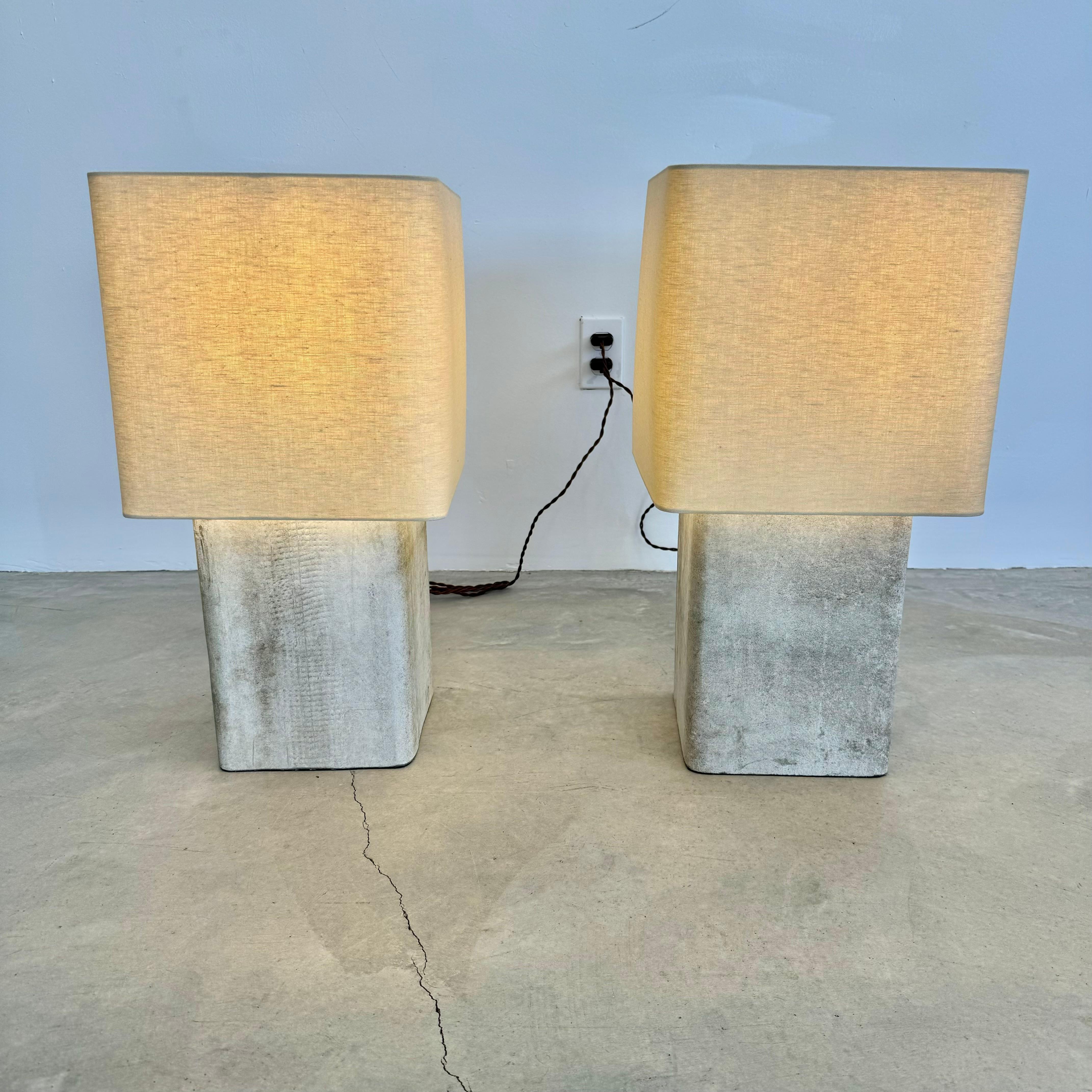 Stunning concrete Willy Guhl lamp by Eternit with teak top cover. Concrete made in Swizterland. Newly fitted as a lamp, re-wired with a new custom linen shade with rounded edges and light diffusor on top. Stunning simplicity and beautiful texture