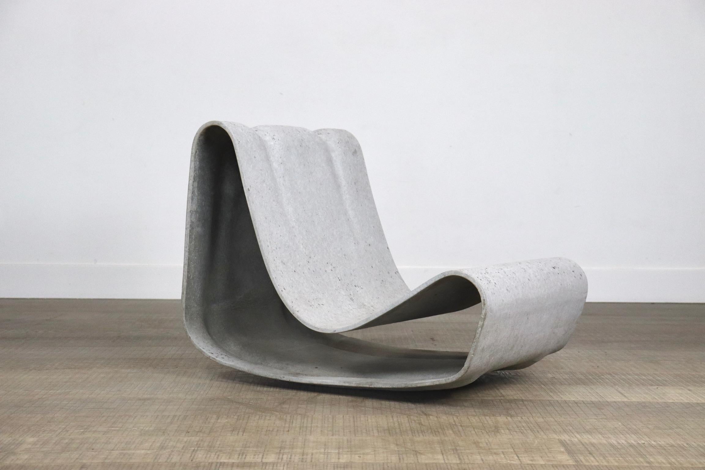Incredible Loop chair by Willy Guhl for Eternit, 1990s. 
This iconic design by Willy Guhl was first designed in 1954 for Eternit. 
The fine lines and open structure makes it a beautiful piece to enjoy both indoors or outdoors. The material, fibre