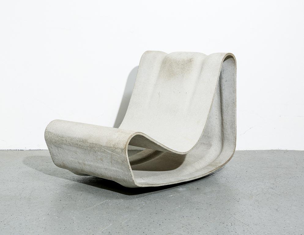 Vintage Willy Guhl 'Loop' outdoor lounge chair. Constructed of a single piece of fiber cement. Signed.
