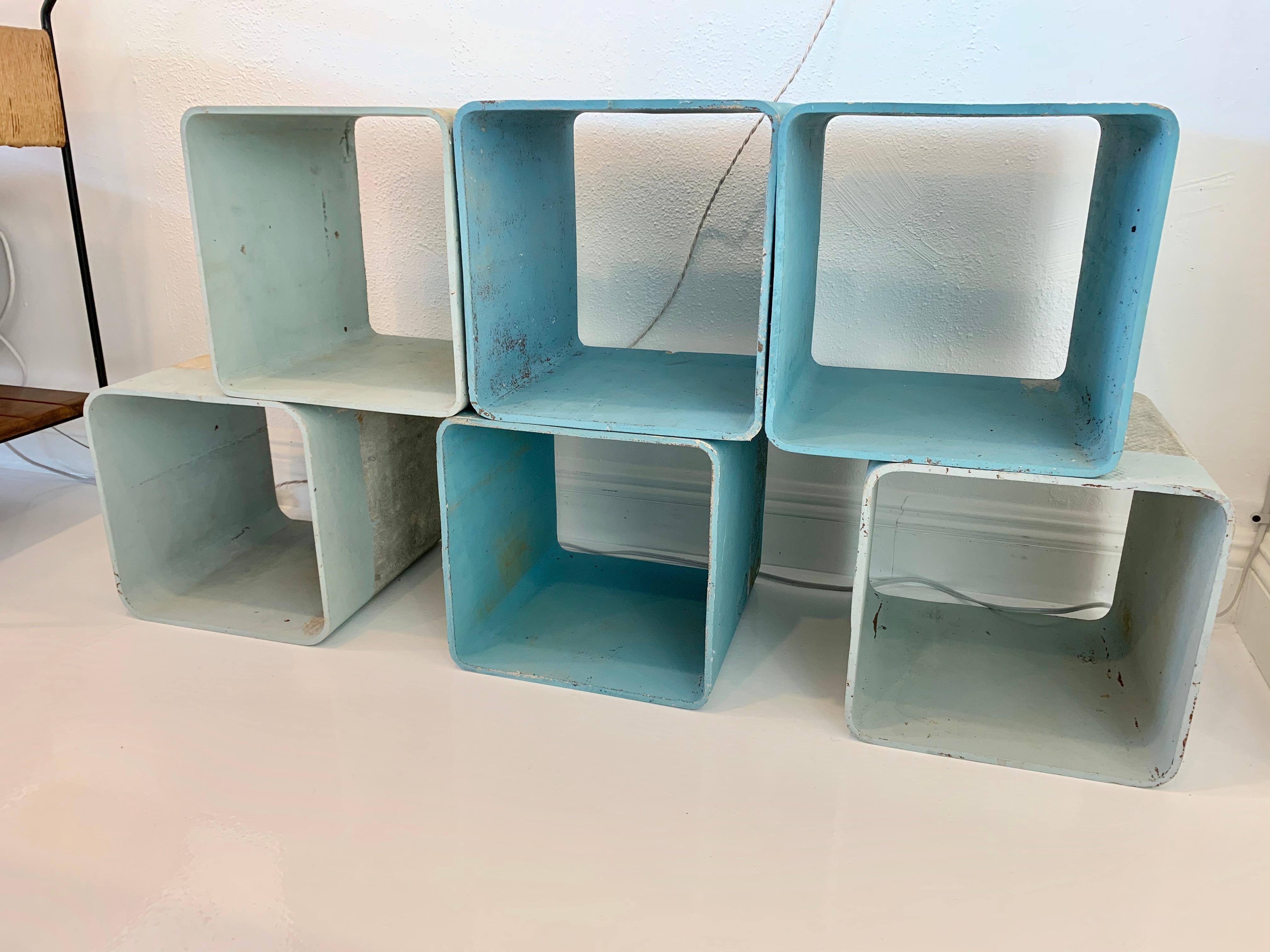 Fantastic cement cubes by Swiss Architect Willy Guhl, for Eternit. 6 modular cubes made of fiber cement, can be arranged in a multitude of ways. Great for holding books, shoes, objects. 6 available. Priced individually. 


Cube dimensions: 13.6