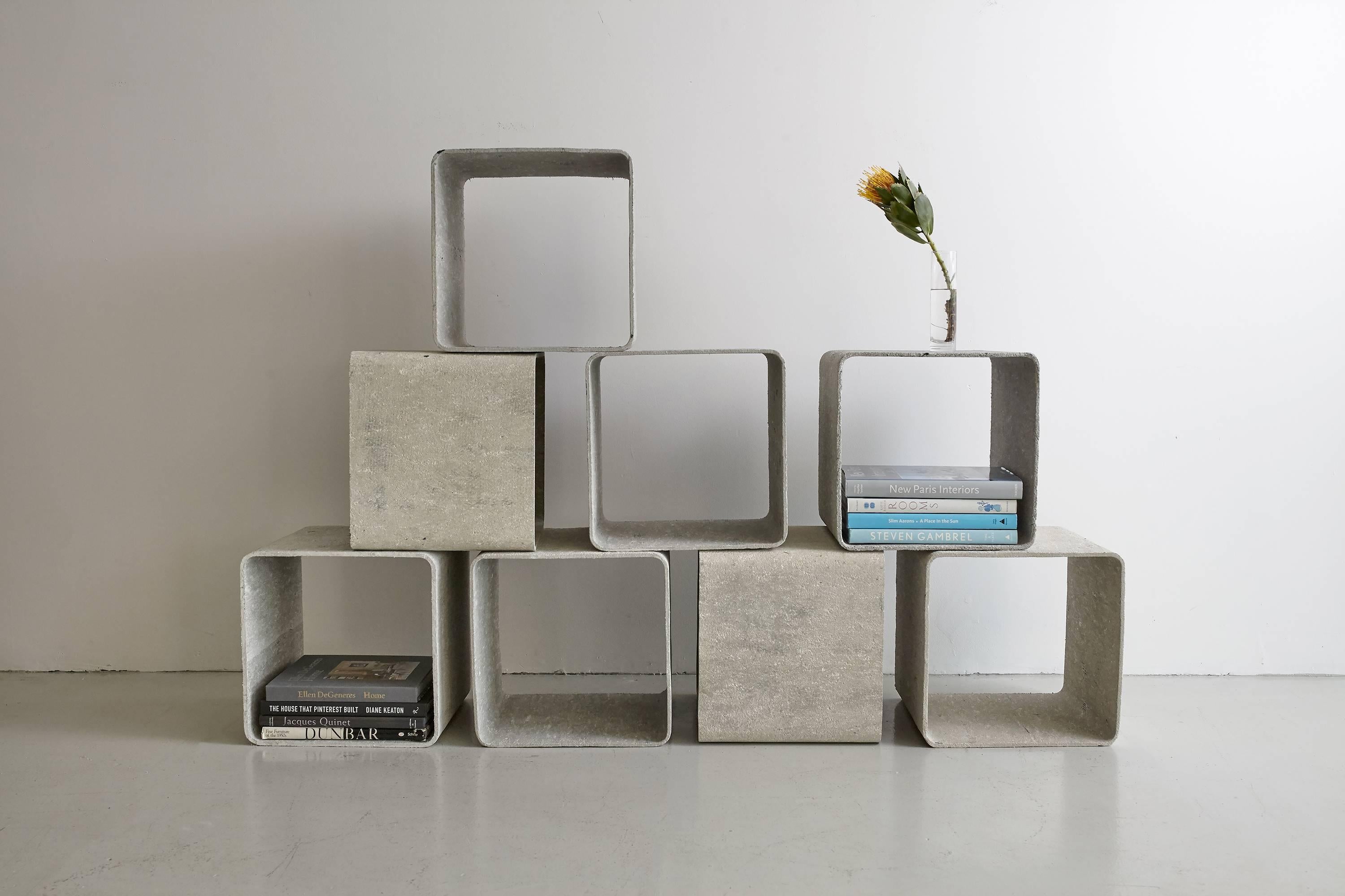 Incredibly rare cement and fiber modular shelving cubes by Willy Guhl. Each cement cube is freestanding and light weight enough to rearrange with ease. Would make an incredible room divider, media storage, or display shelves! Great patina. Suitable