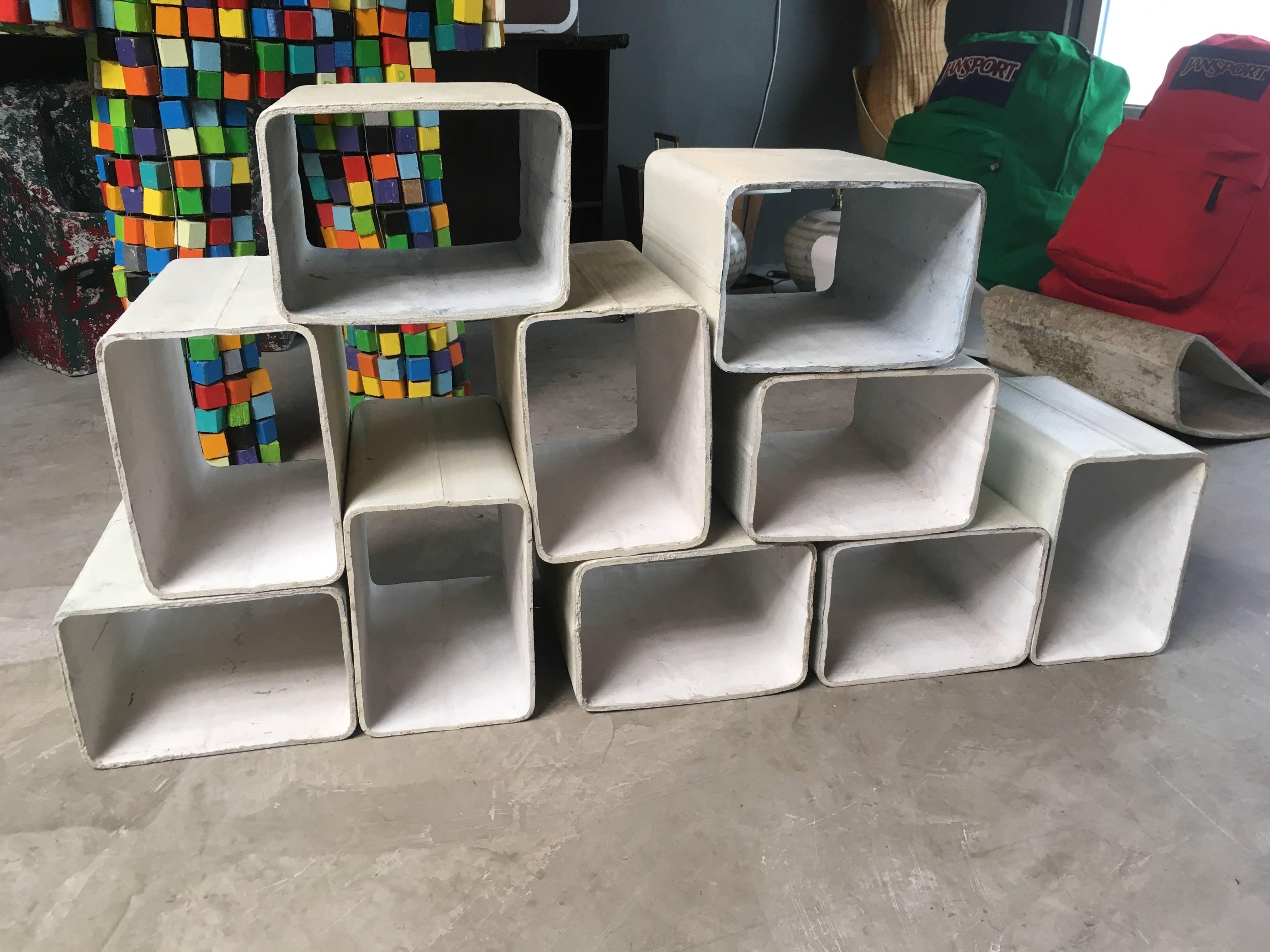 Fantastic set of ten modular cement cubes by Swiss architect Willy Guhl for Eternit. Very rare set in great vintage condition. Unit consists of ten large square/rectangular cubes. Can be arranged in a multitude of ways. Great standalone sculpture