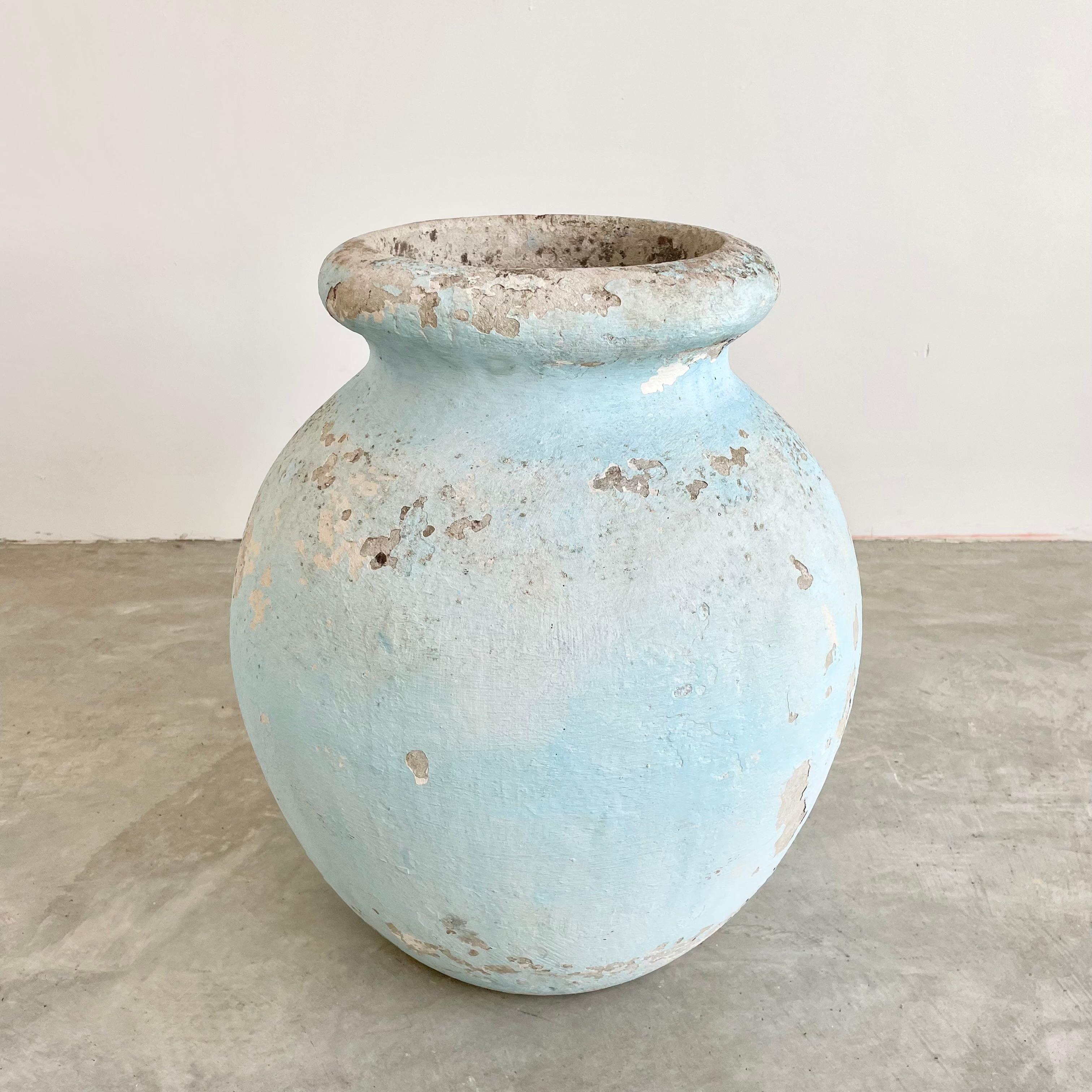 Concrete olive jar planter by Willy Guhl with great patina and prominent presence. Beautiful pastel blue patina. Simple and elegant design perfect for any garden or patio. Excellent vintage condition. One available in this coloring/patina. 

Mouth