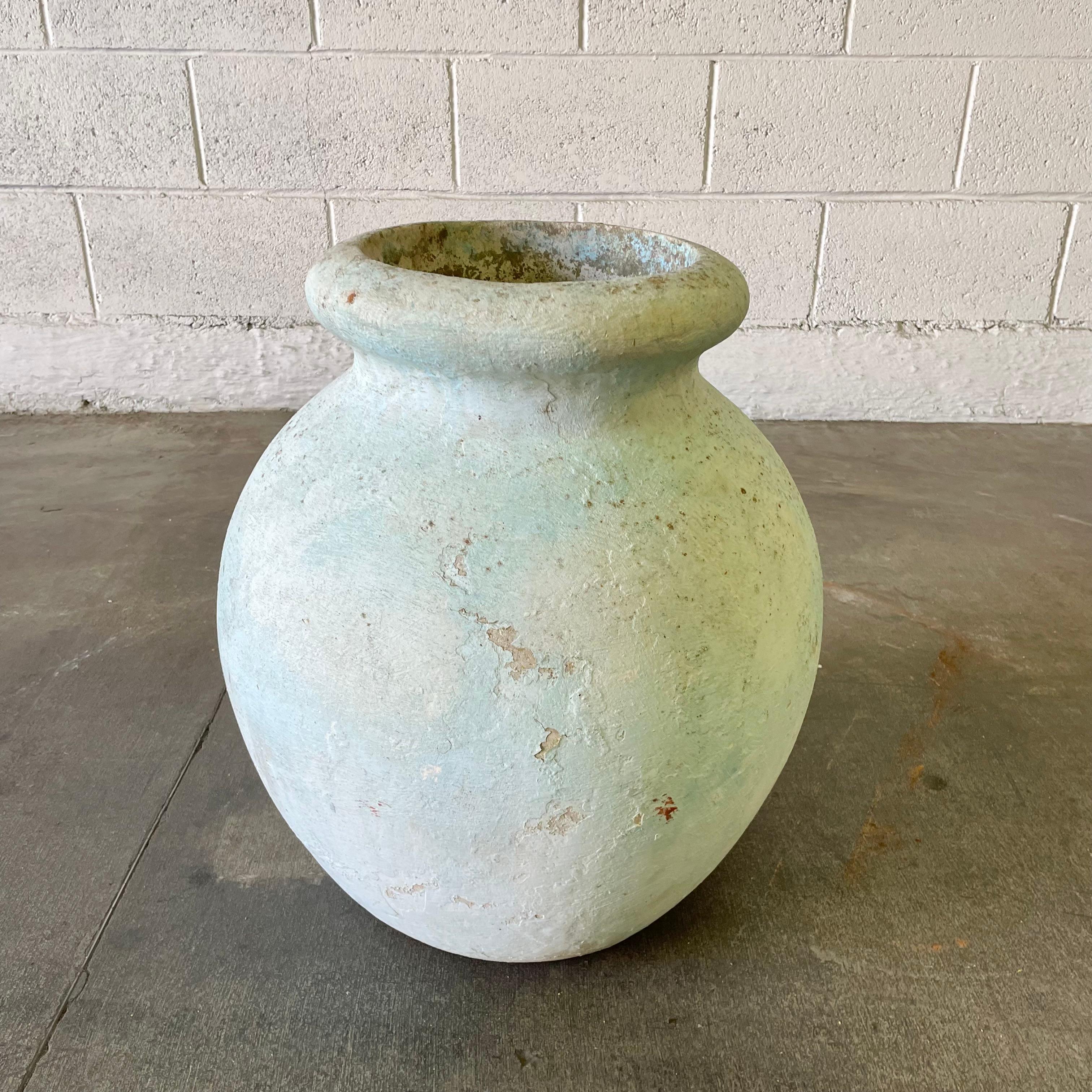 Concrete olive jar planter by Willy Guhl, with great patina and prominent presence. Beautiful pastel blue patina. Simple and elegant design perfect for any garden or patio. 

Mouth opening measures 8.5