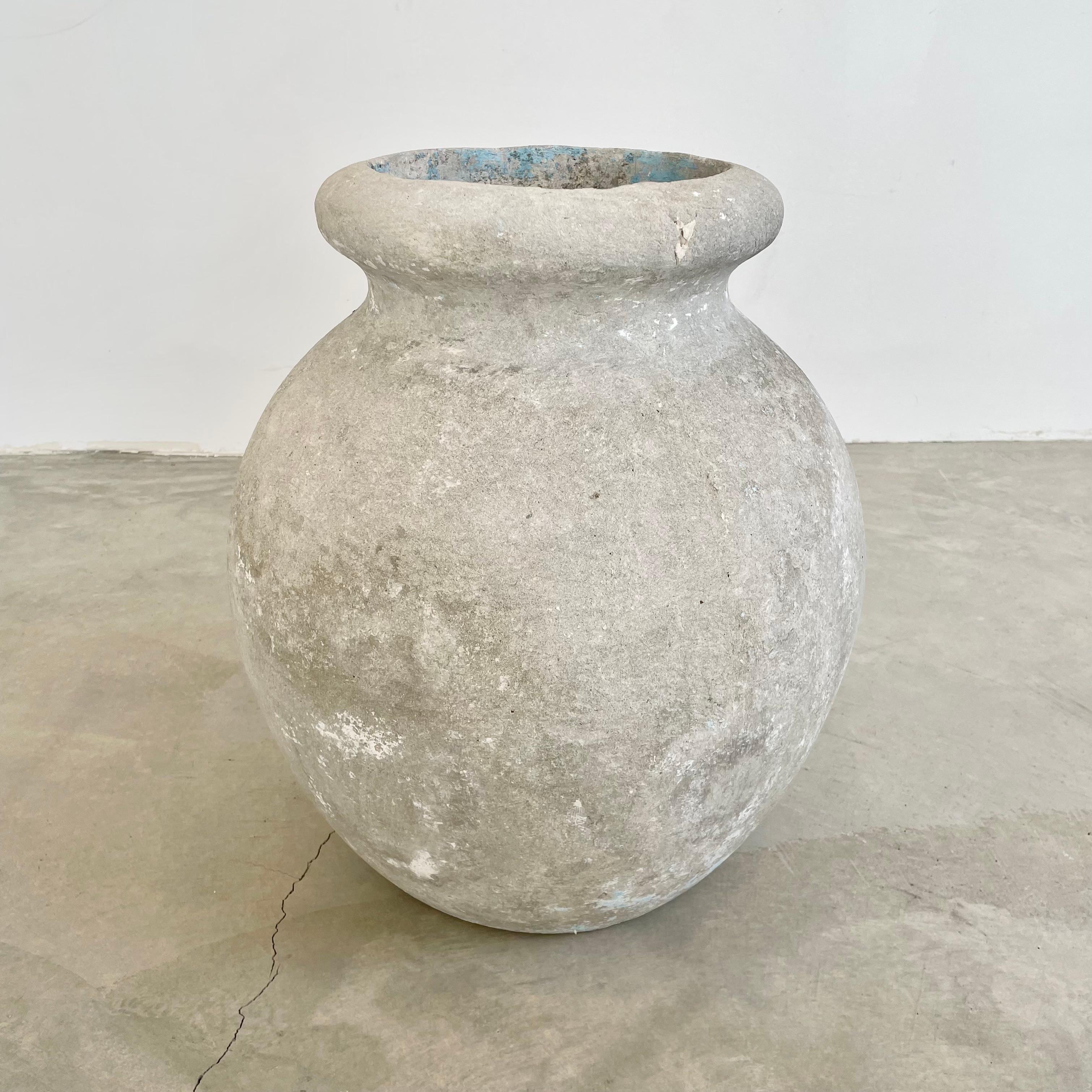 Concrete olive jar planter by Willy Guhl with great patina and prominent presence. Beautiful light patina with white and blue flecks. Simple and elegant design perfect for any garden or patio. Excellent vintage condition. One available in this