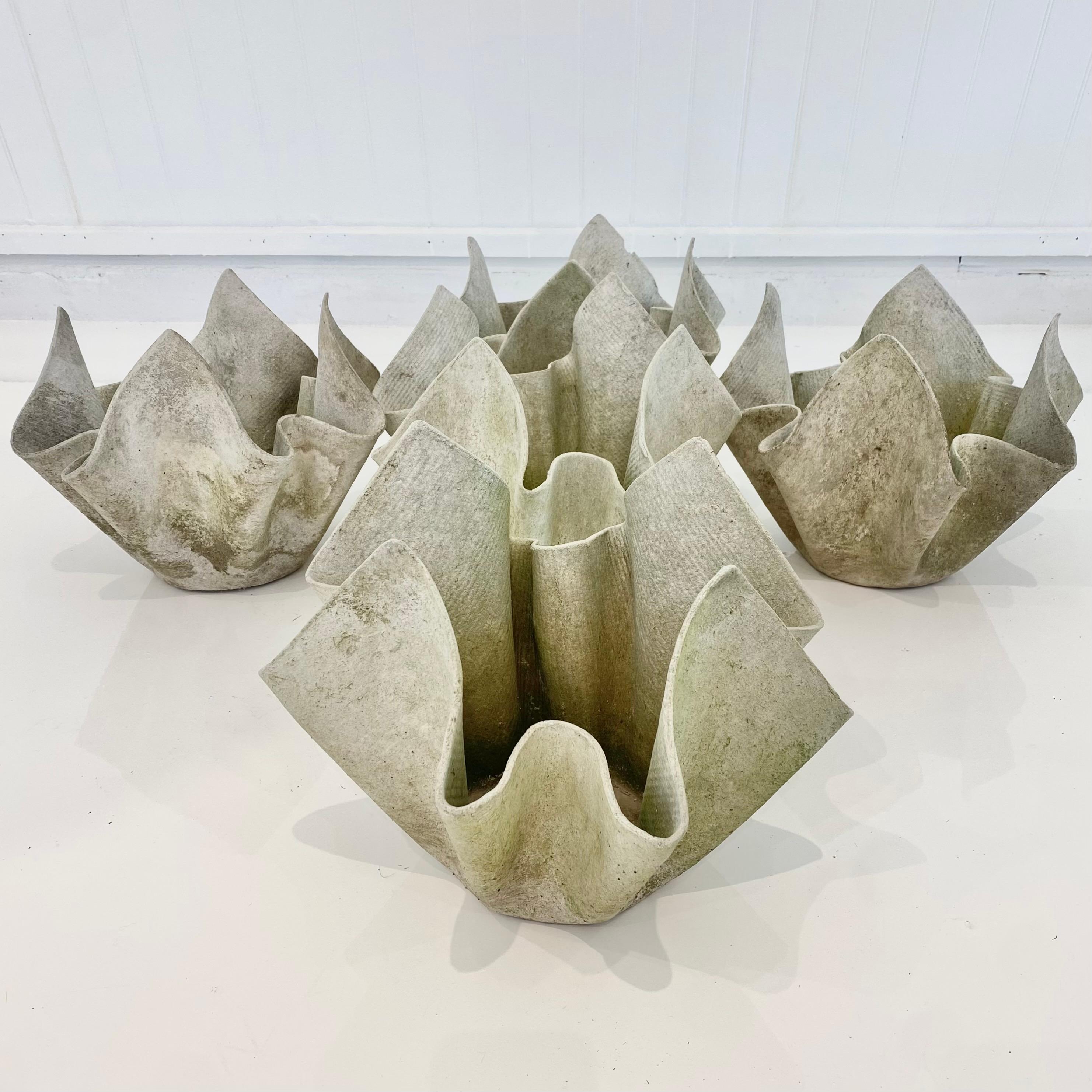 Sculptural handkerchief planters by Swiss architect Willy Guhl for Eternit. Rare design with a mossy green patina over grey concrete. Made of fibre cement. Great coloring. Unique standalone sculpture or planter. Good vintage condition. Priced