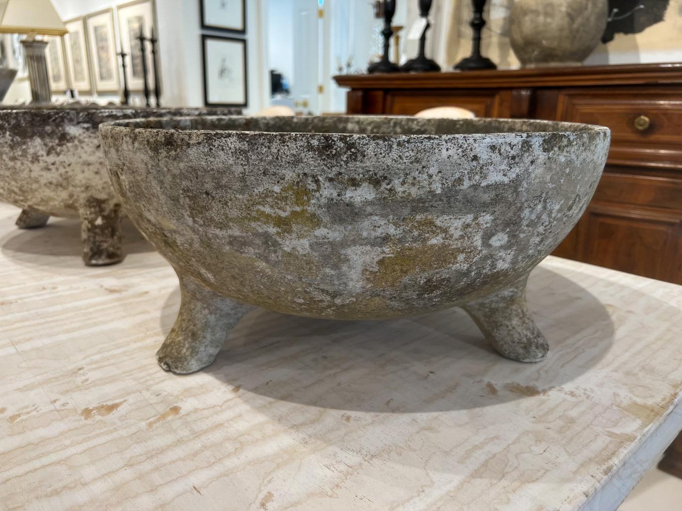 Willy Guhl was a famous Swiss designer who created planters in many shapes. These are formed from a slab of Eternit (a fibrous concrete material) moulded into a bowl with feet.
 