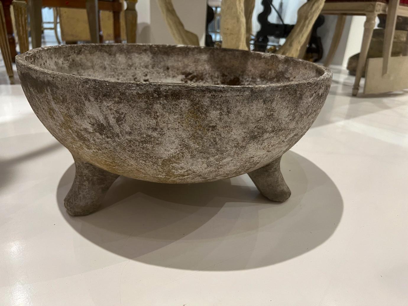 Willy Guhl was a famous Swiss designer who created planters in many shapes. These are formed from a slab of Eternit (a fibrous concrete material) moulded into a bowl with feet.
   