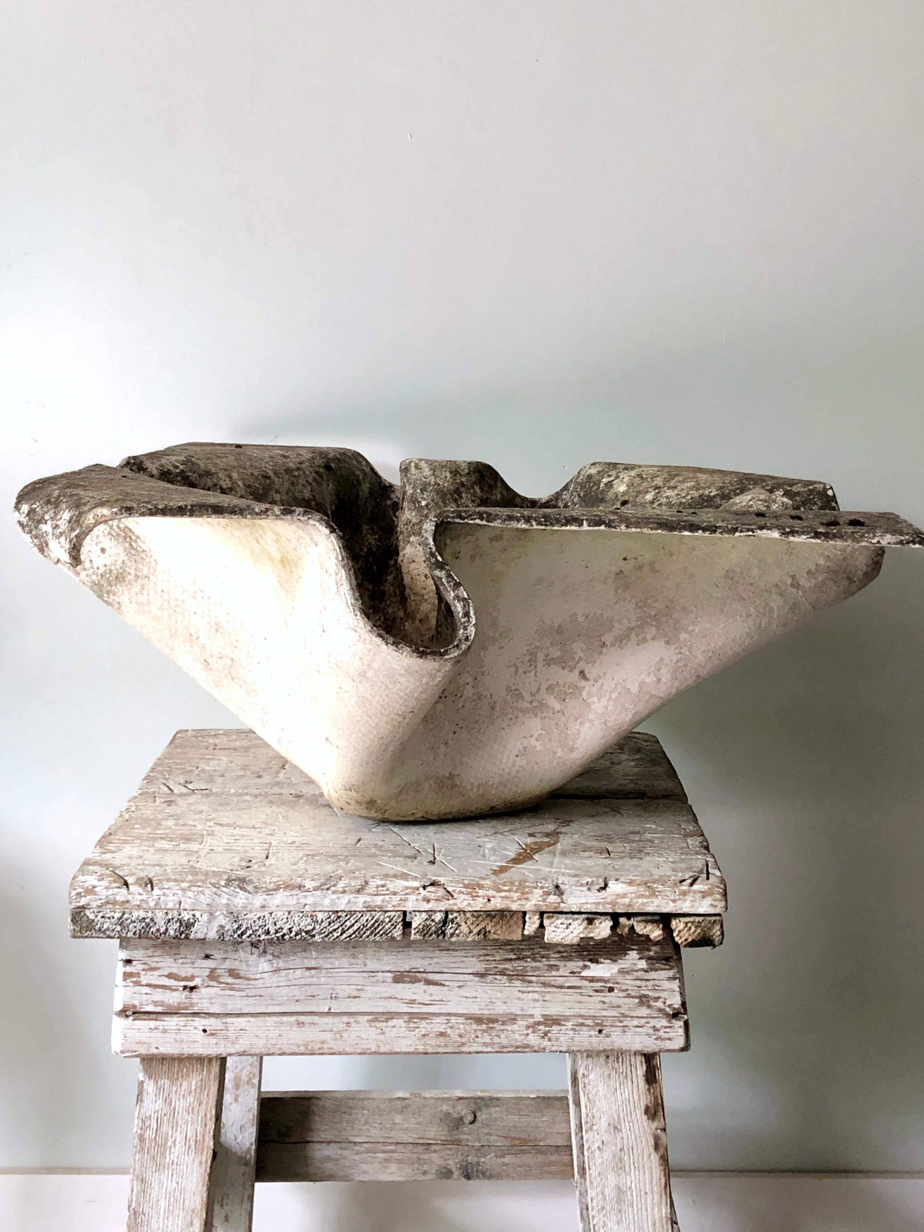 Whimsical planter designed after Swiss trained cabinet maker, the Pioneer of Industrial Design and teacher Willy Guhl, 