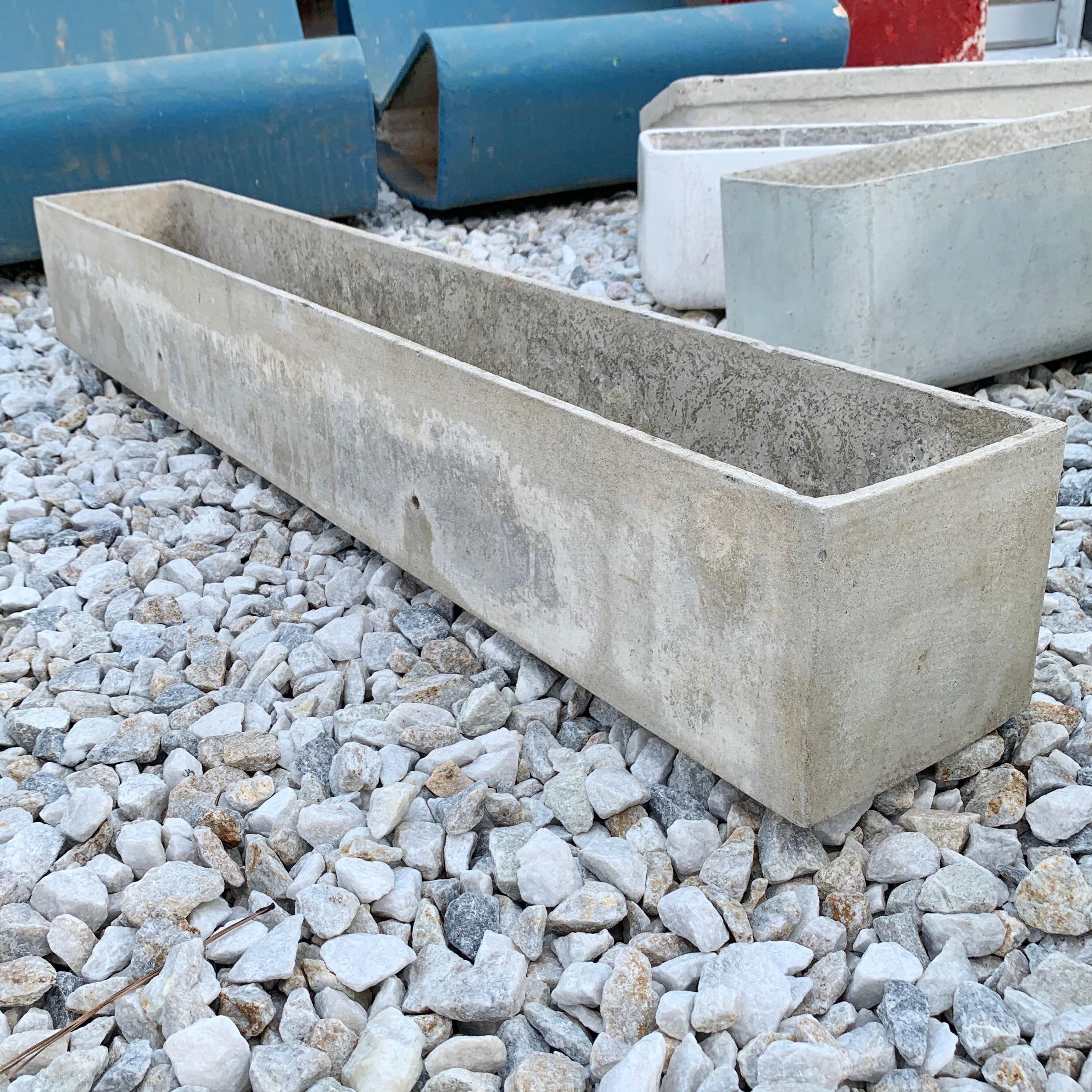 Classic rectangular concrete trough planter by Willy Guhl. Great patina and age to concrete. Four factory drilled holes on bottom and sides for draining. Good vintage condition 



  