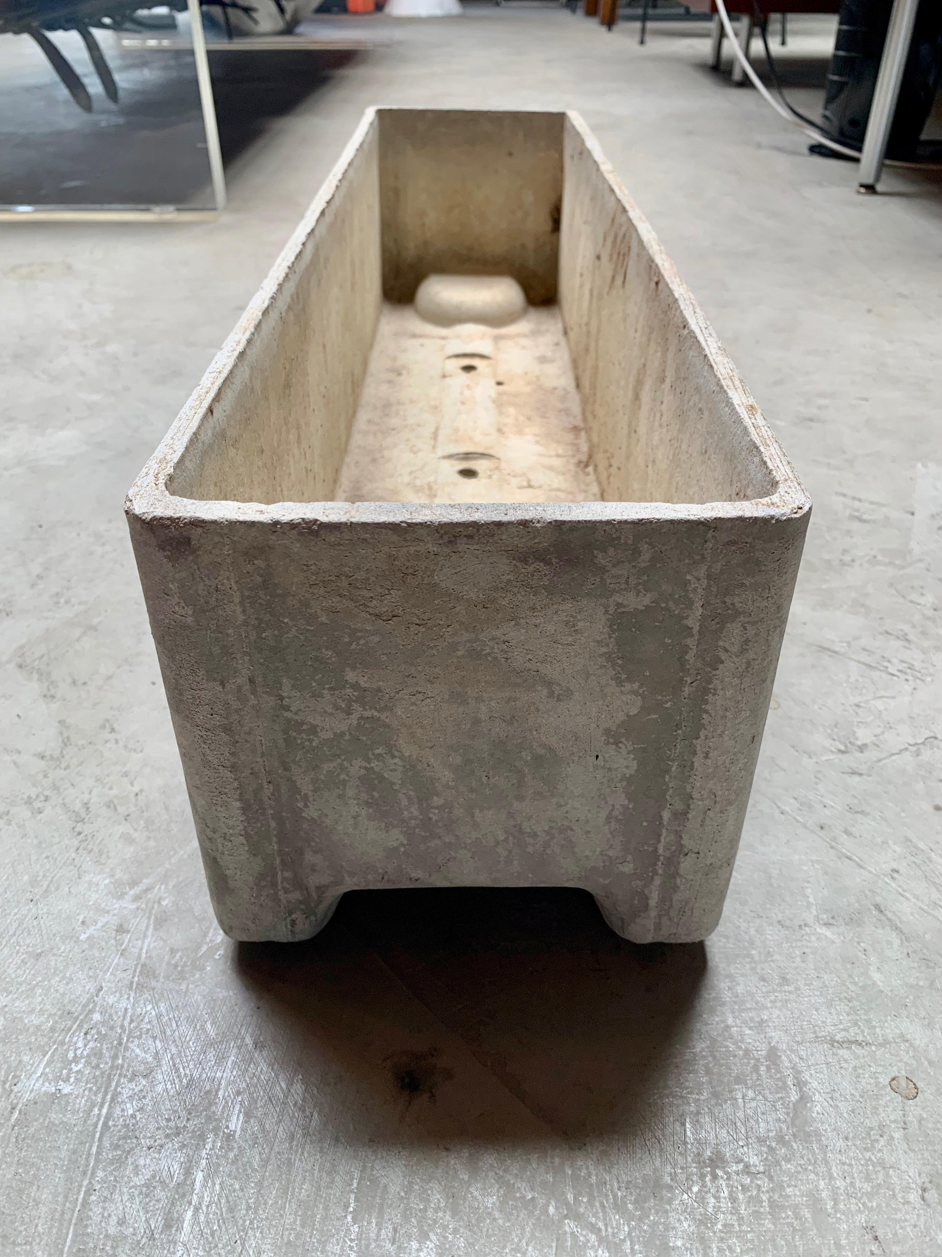 Massive collection of rectangular planter by Swiss architect Willy Guhl for Eternit. Marked Eternit with dates of production. Three holes on bottom of planter allow for drainage. Indented feet on both sides. Great lines and clean design. Excellent