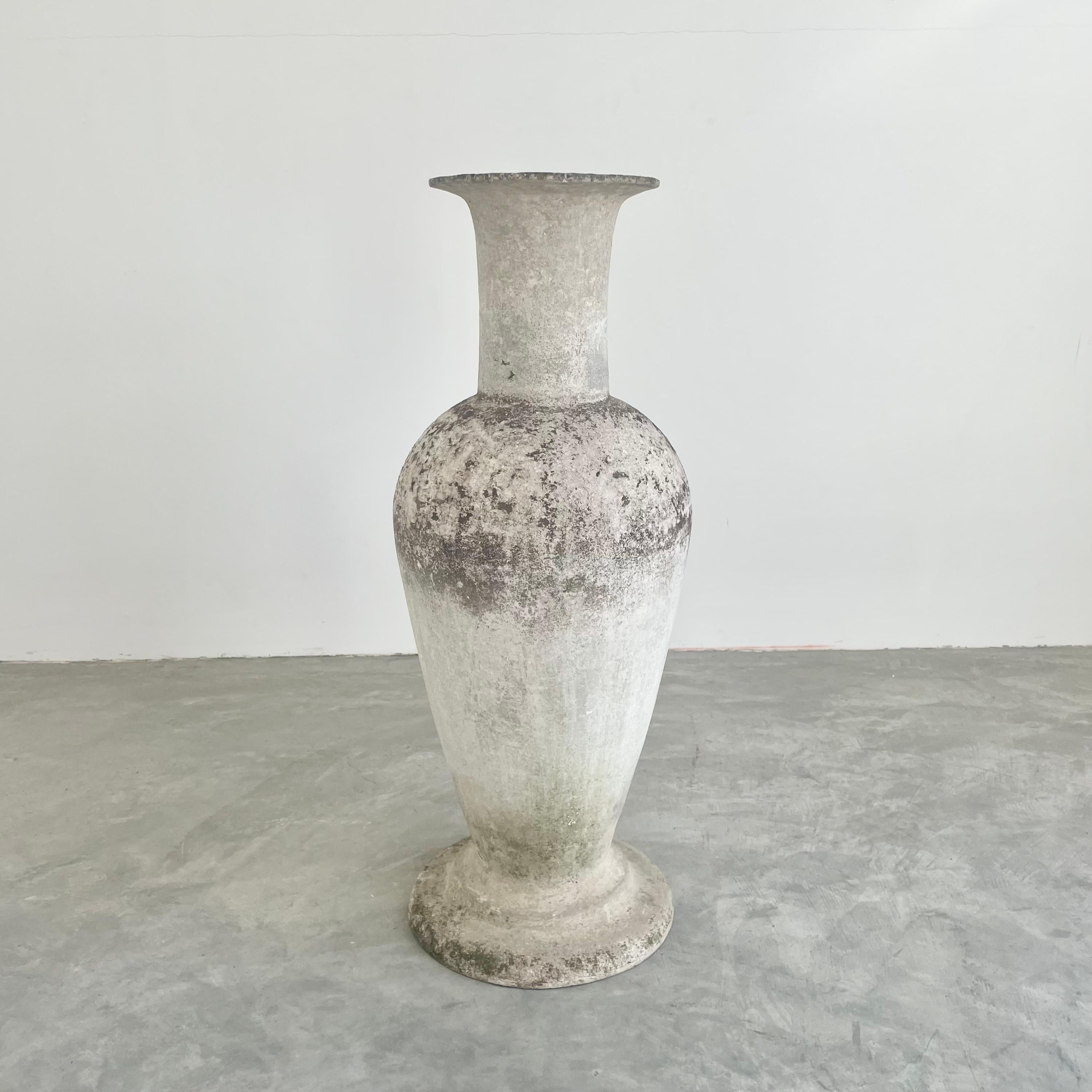 Stunning concrete vase by Willy Guhl. Just under three feet tall. Extremely rare model. Made of fiber cement. Decades of patina and moss/ lichen. Colors vary from grey to white and charcoal. Beautiful texture and color with great presence and a