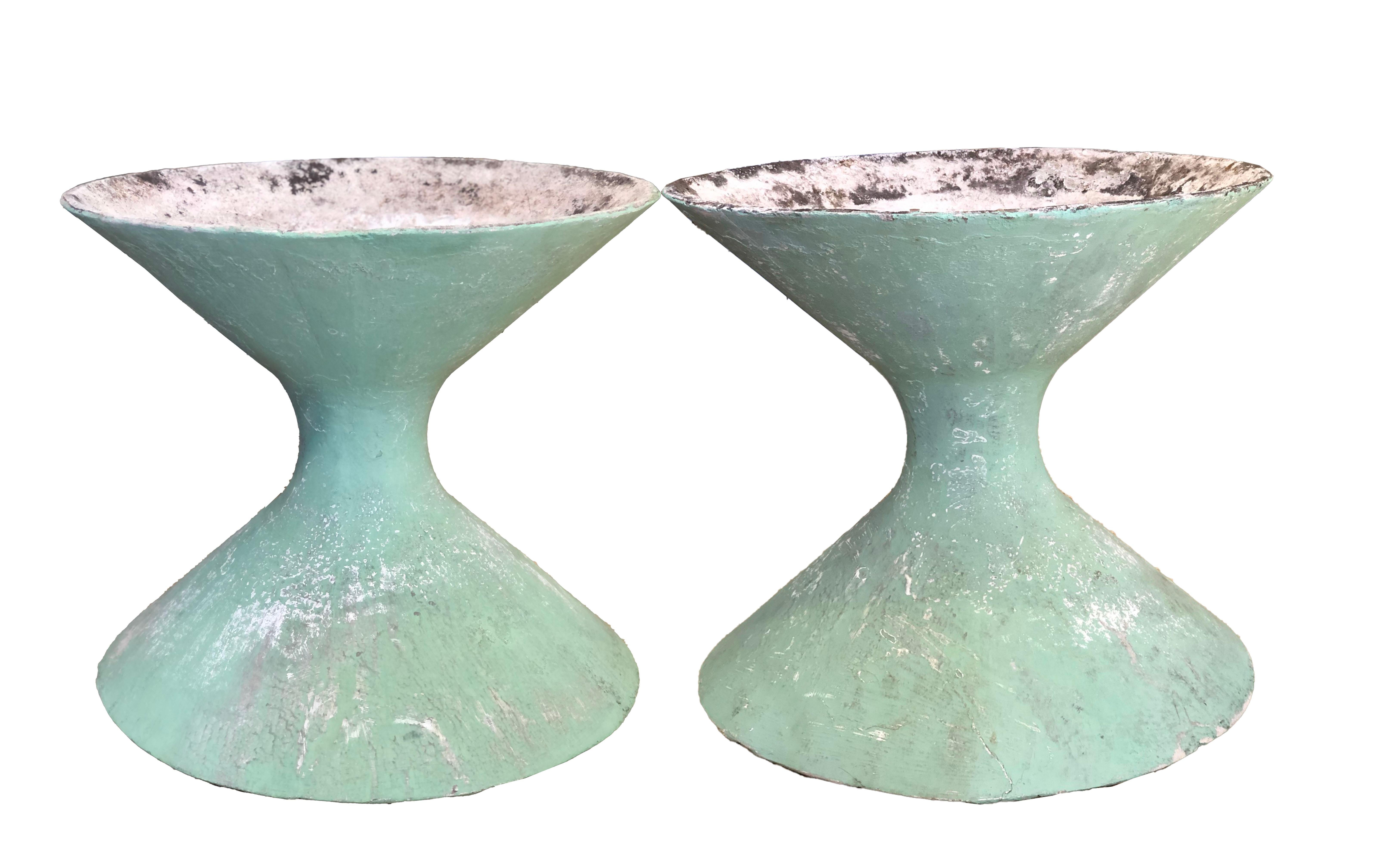 Willy Guhl sculptural hourglass planters in green with beautiful age and patina. Two matching planters available. Priced individually. Very hard to find a pair with color!