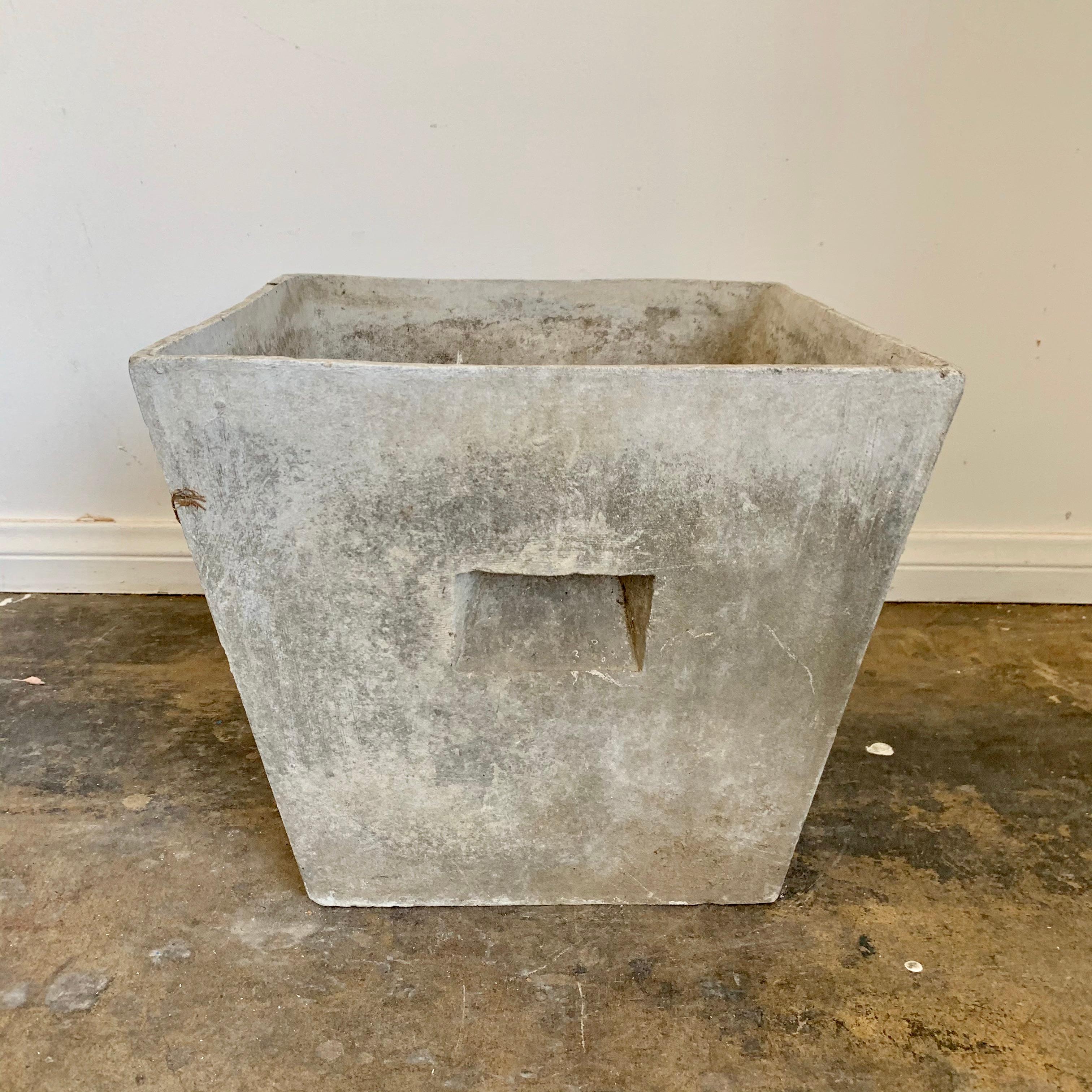Square concrete planter by Willy Guhl. Made in Switzerland in the 1960s. Great condition. Original coloring and patina. Classic square planter with indented handles on both sides. 3 available. Priced individually. 

 


   