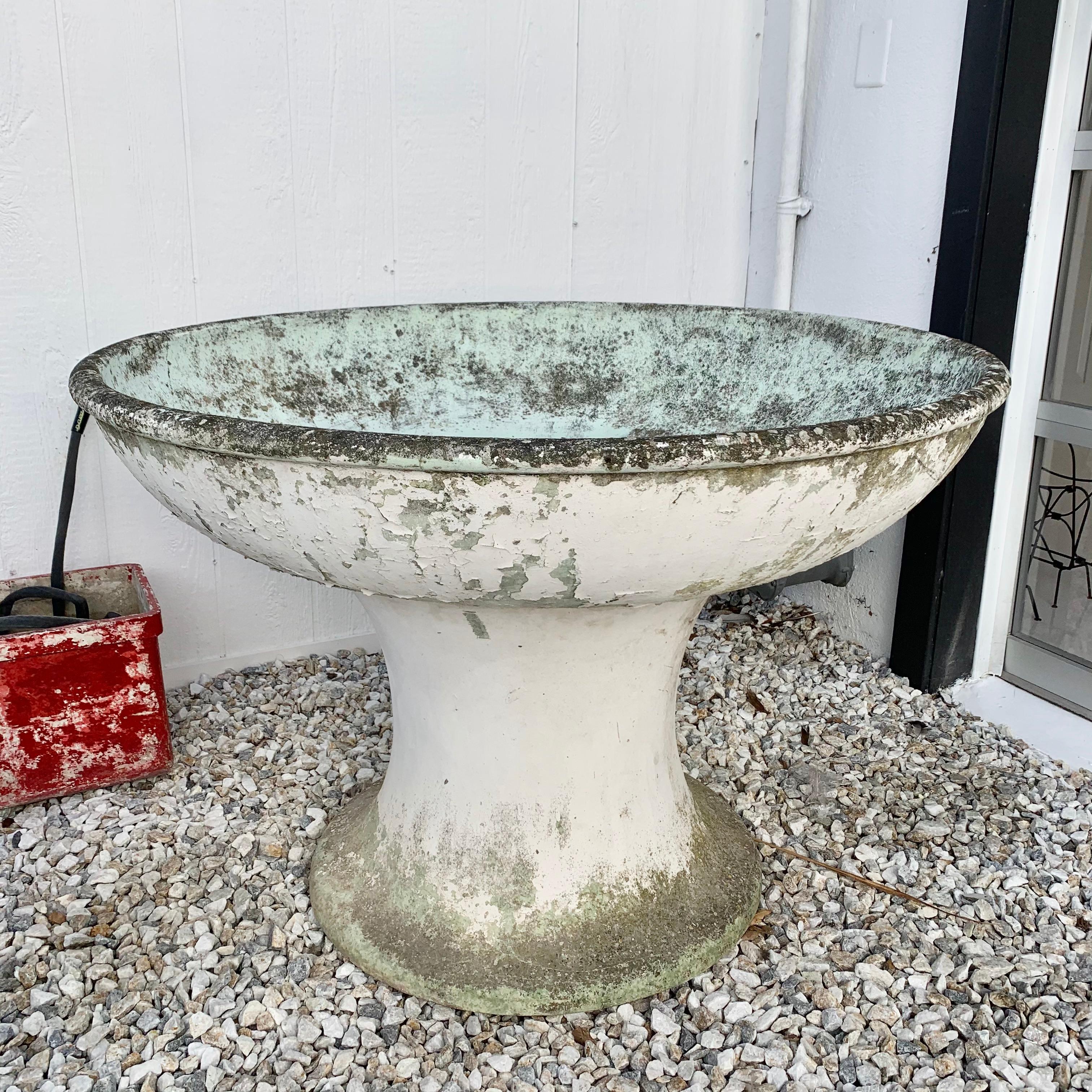 Rare concrete fountains made in Belgium. Dated 8-30-1948. Two-piece fountain with large funnel base and massive bowl top. Great patina and age to concrete. Factory drilled holes for water and drainage. Large opening on base for water pump/supplies.