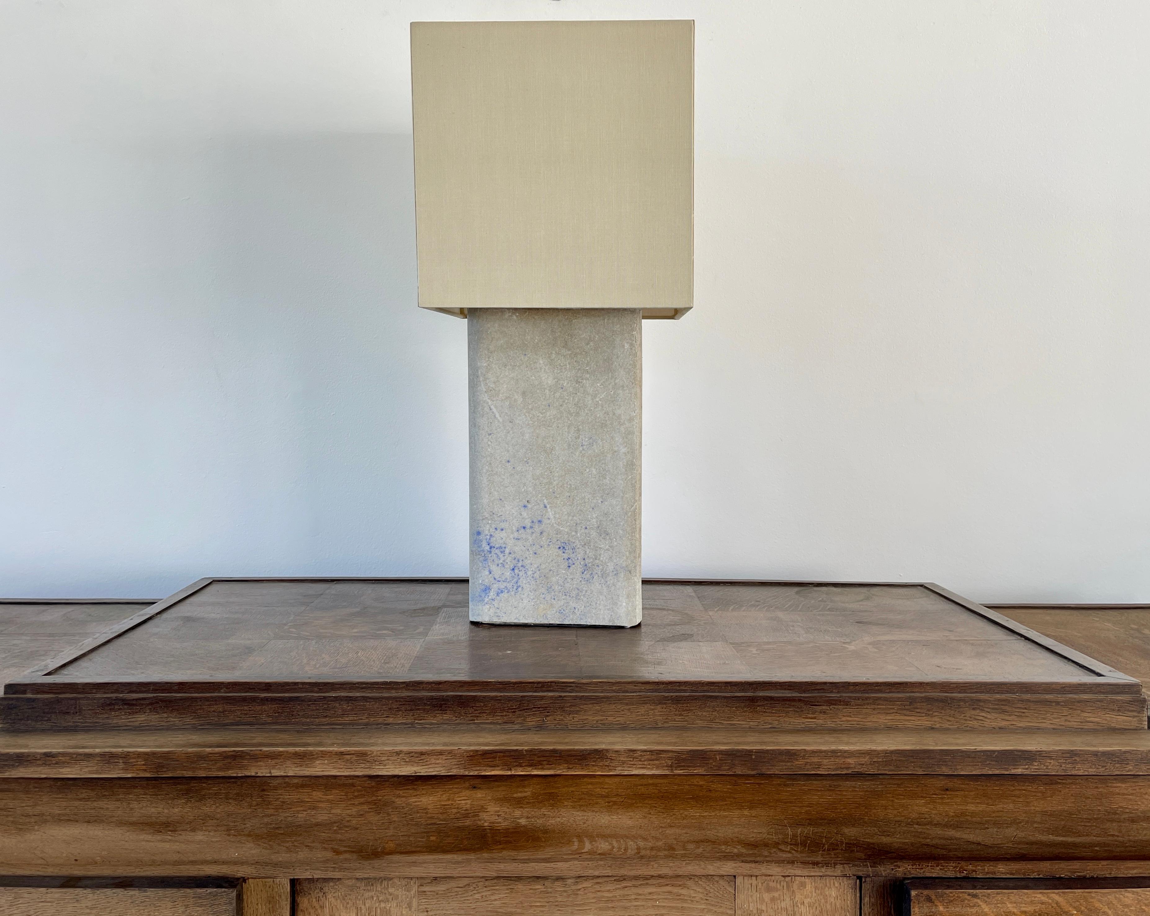Willy Guhl concrete cube made into a table lamp with linen shade and teak wood.
Priced individually.
Wonderful blue-is patina 
Measure: Shade 12.25