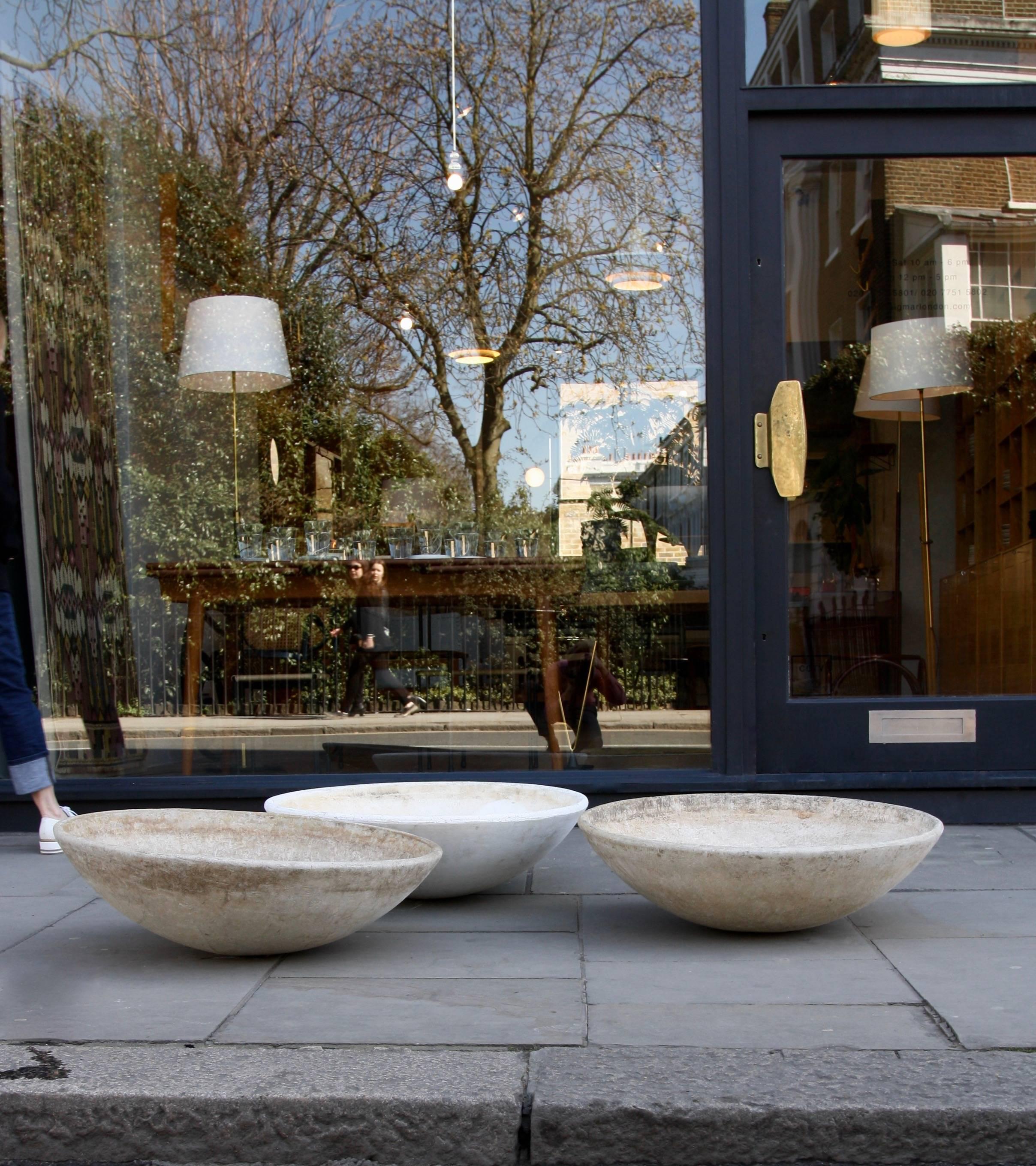 Three extra large flying saucer shaped concrete planters designed by Willy Guhl in the 1950s.
The pots are made from fibre cement by Eternit (which is sometimes used as a generic term for fibre cement).
These fantastically shaped planters are