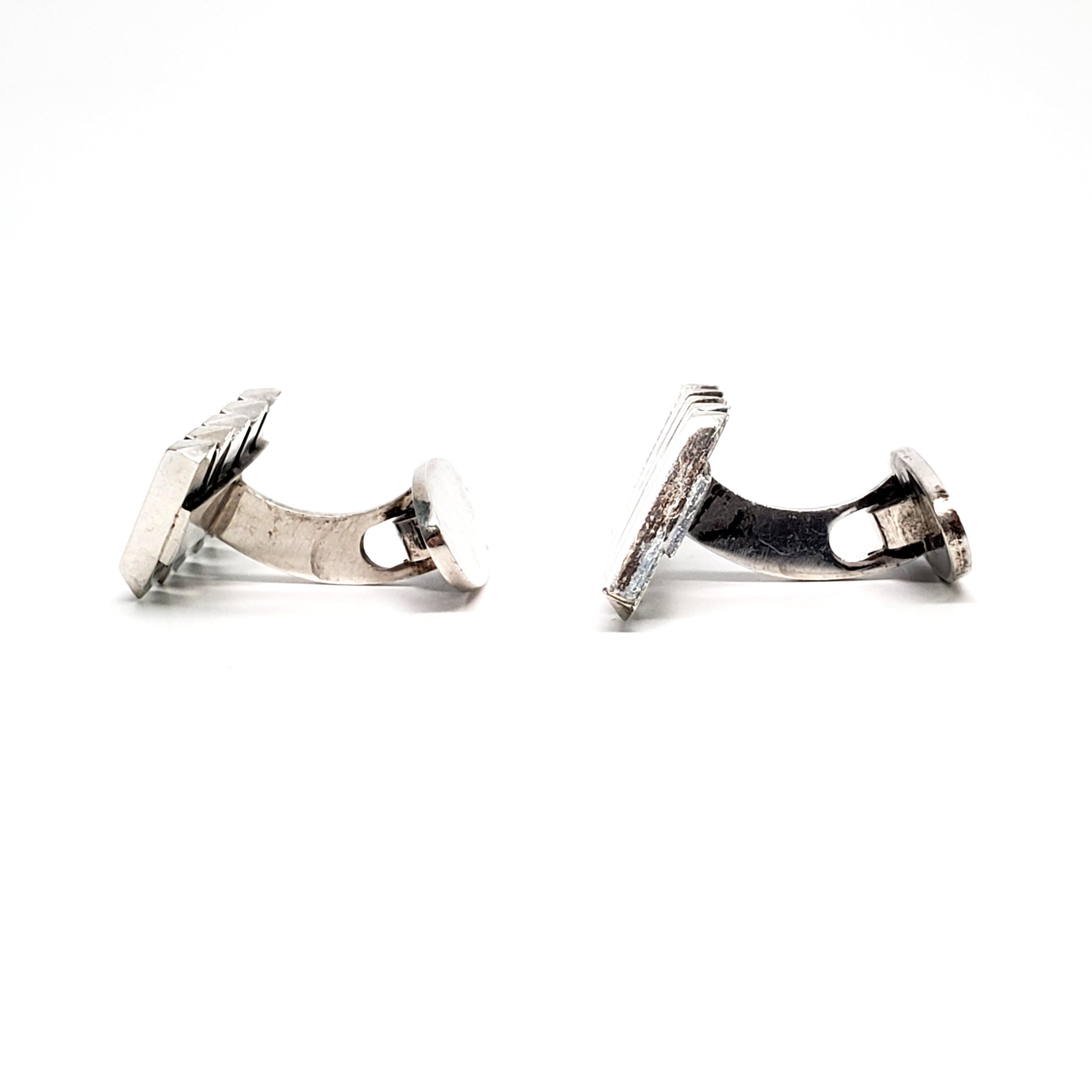 Vintage sterling silver cuff links by Willy Jacob Krogmar.

Exceptional example of Krogmar's mid-century modern Danish design.

Measures 1 1/8