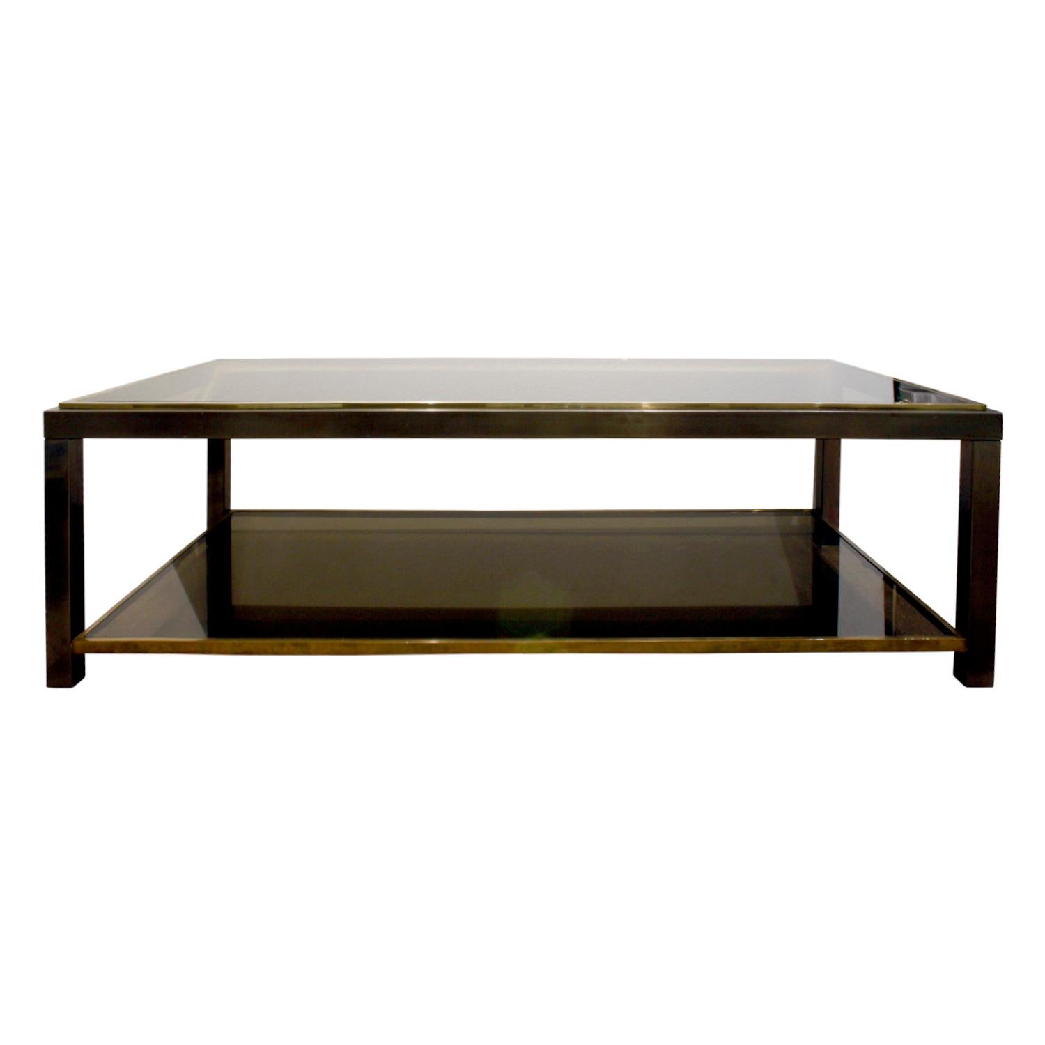 2-tier coffee table in gunmetal and brass with inset bronze glass by Willy Rizzo, Italian, 1960s.