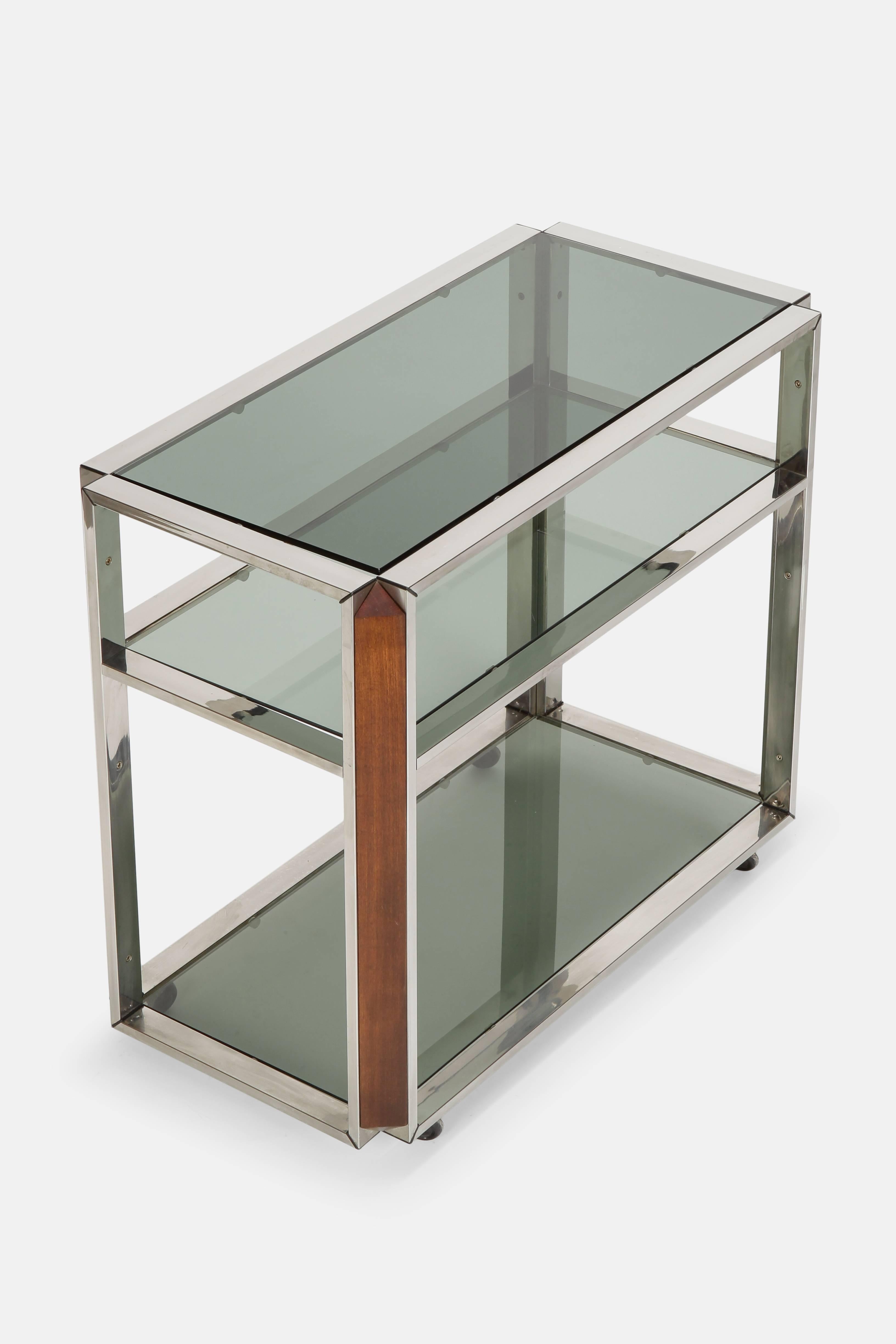 Willy Rizzo bar cart manufactured in the 1970s in Italy. Chrome frame with tinted glass and darkend beech wood details. Some signs of use.