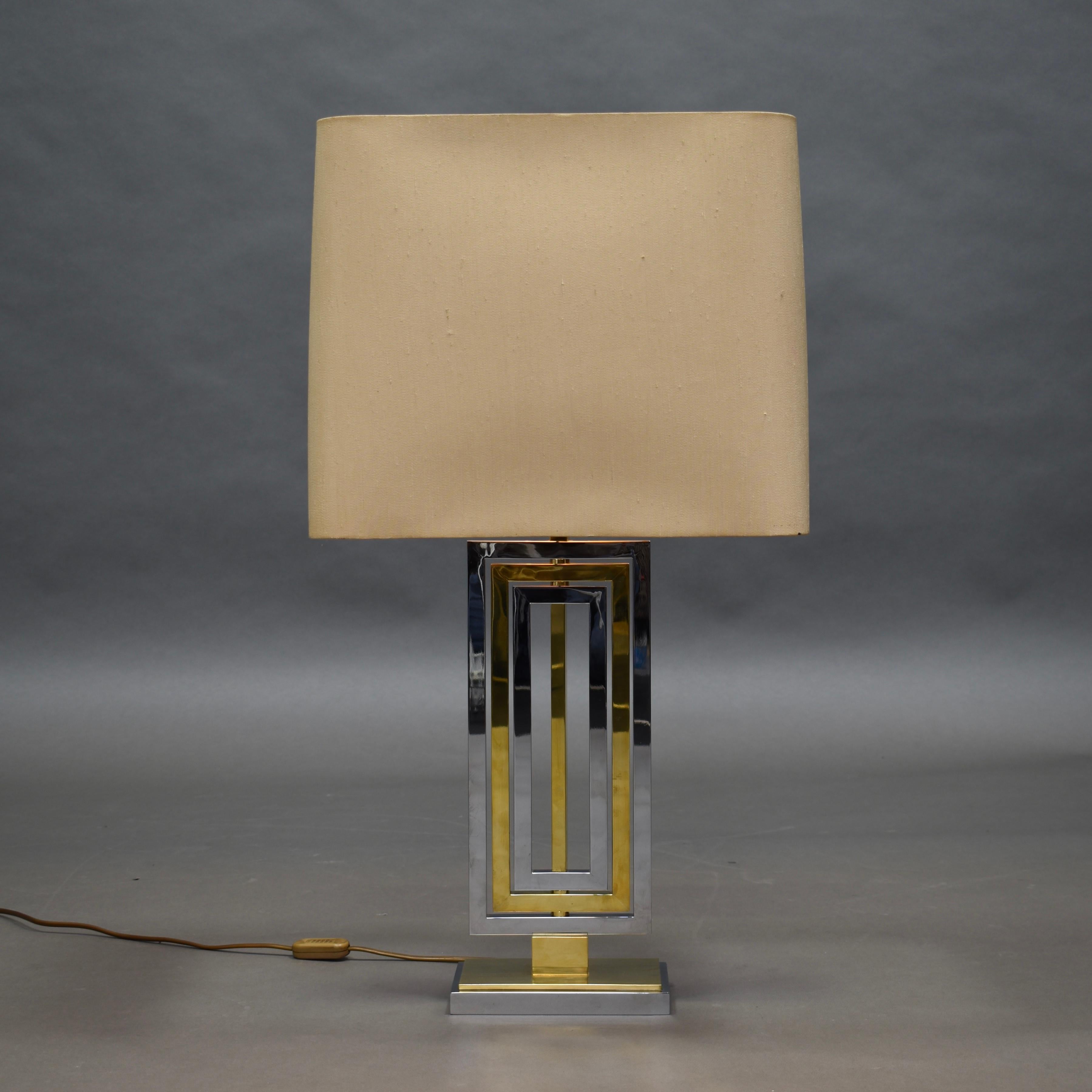 Brass and chrome table lamp by Willy Rizzo, Italy, circa 1970.

Designer: Willy Rizzo

Country: Italy

Model: Table lamp

Material:

Design period: circa 1970

Size in cm: W 19 x D 12 x H 51 centimeter

Condition: Very good / the shade