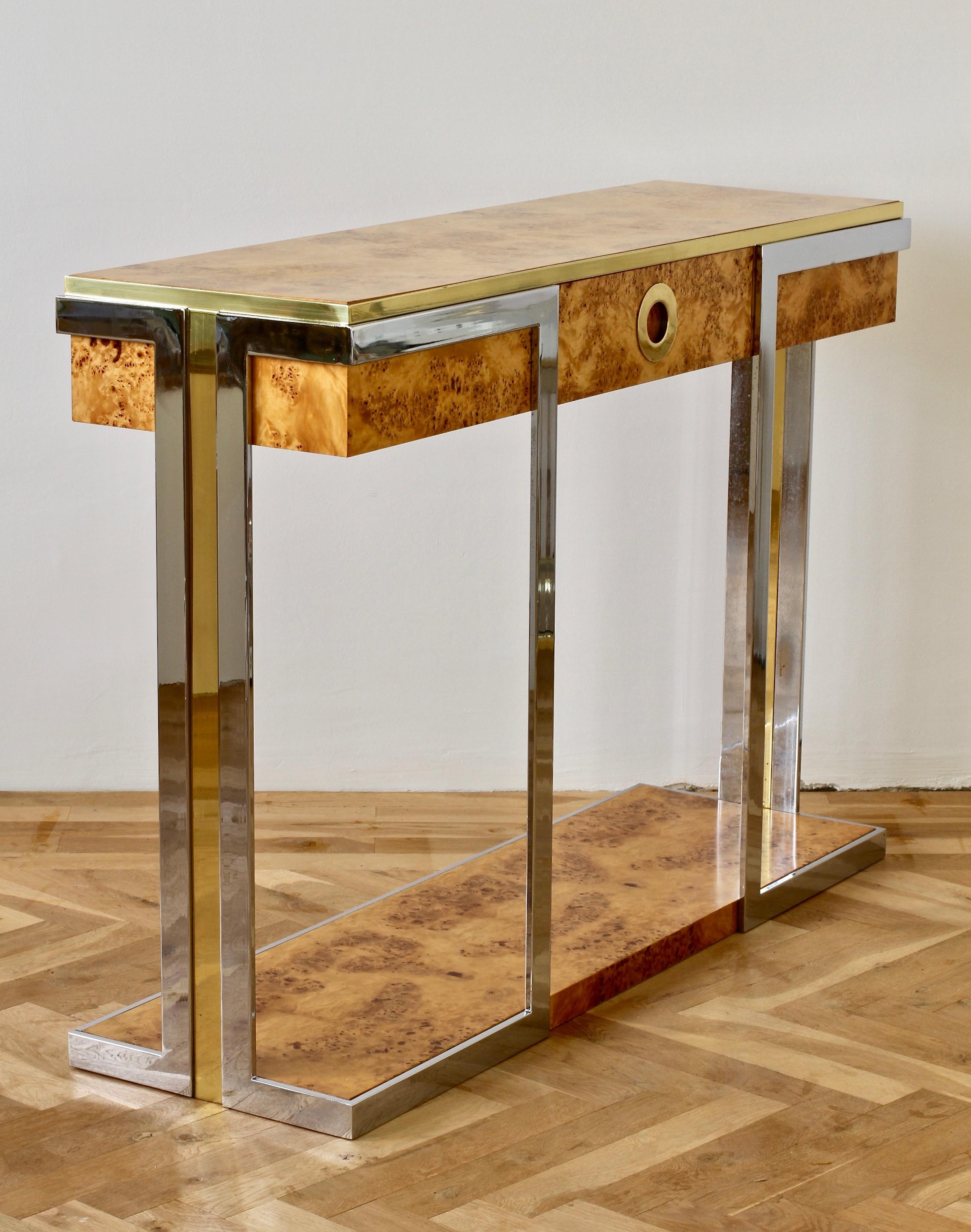 Willy Rizzo for Mario Sabot Industries console, hallway, foyer or entry table. Featuring burled olive wood veneer with brass and chrome legs - this piece has a contemporary Art Deco feel and style about it whilst, at the same time, fitting