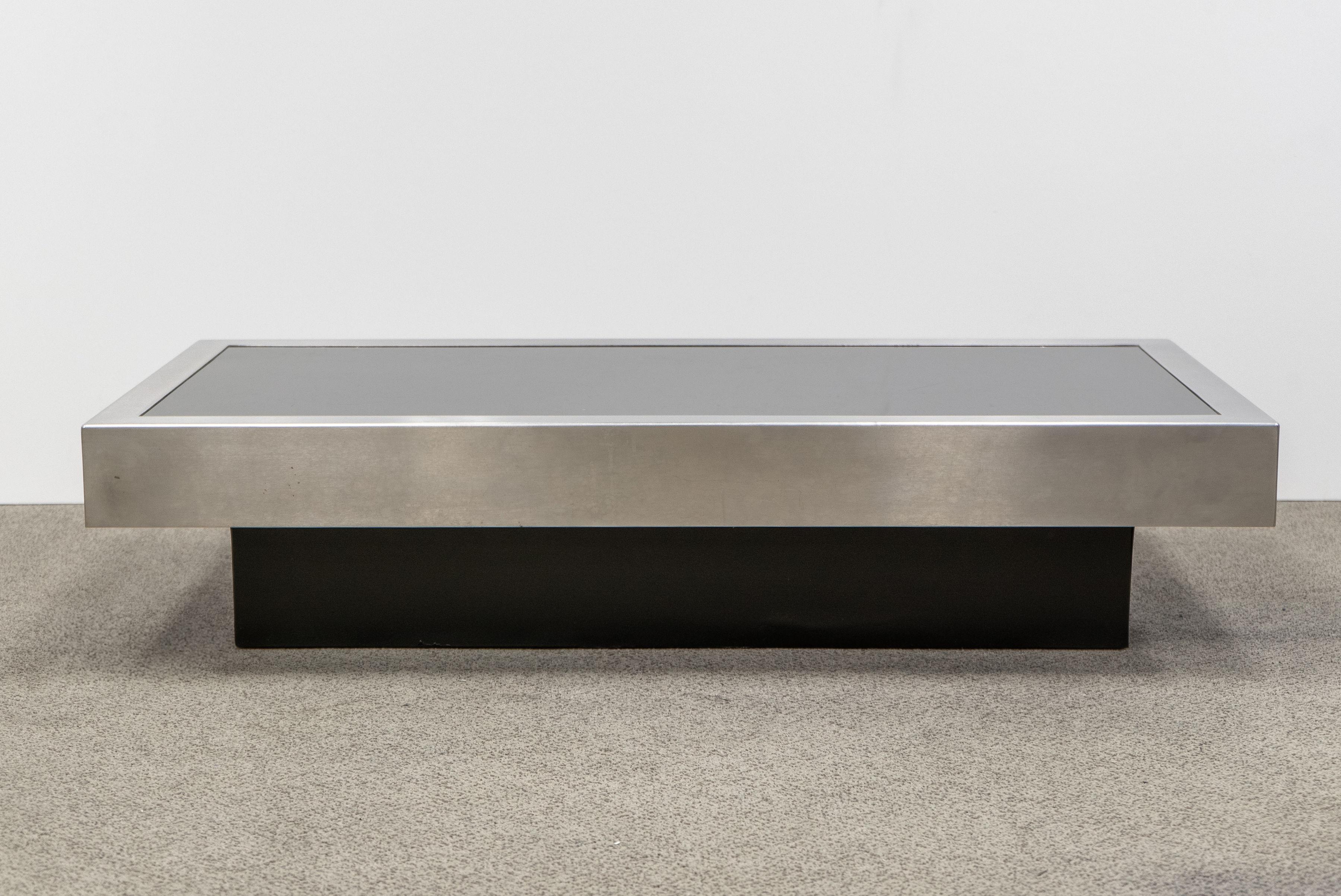 Willy rizzo coffee table in back and chrome. Scratches on top consistent with vintage condition.
