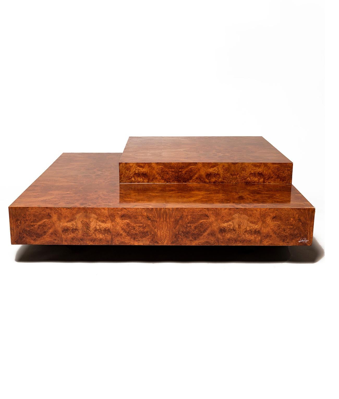Willy Rizzo coffee table, designed across two levels with a hovering effect. 
Wood veneer with brass feet and Willy Rizzo's iconic signature to one corner.