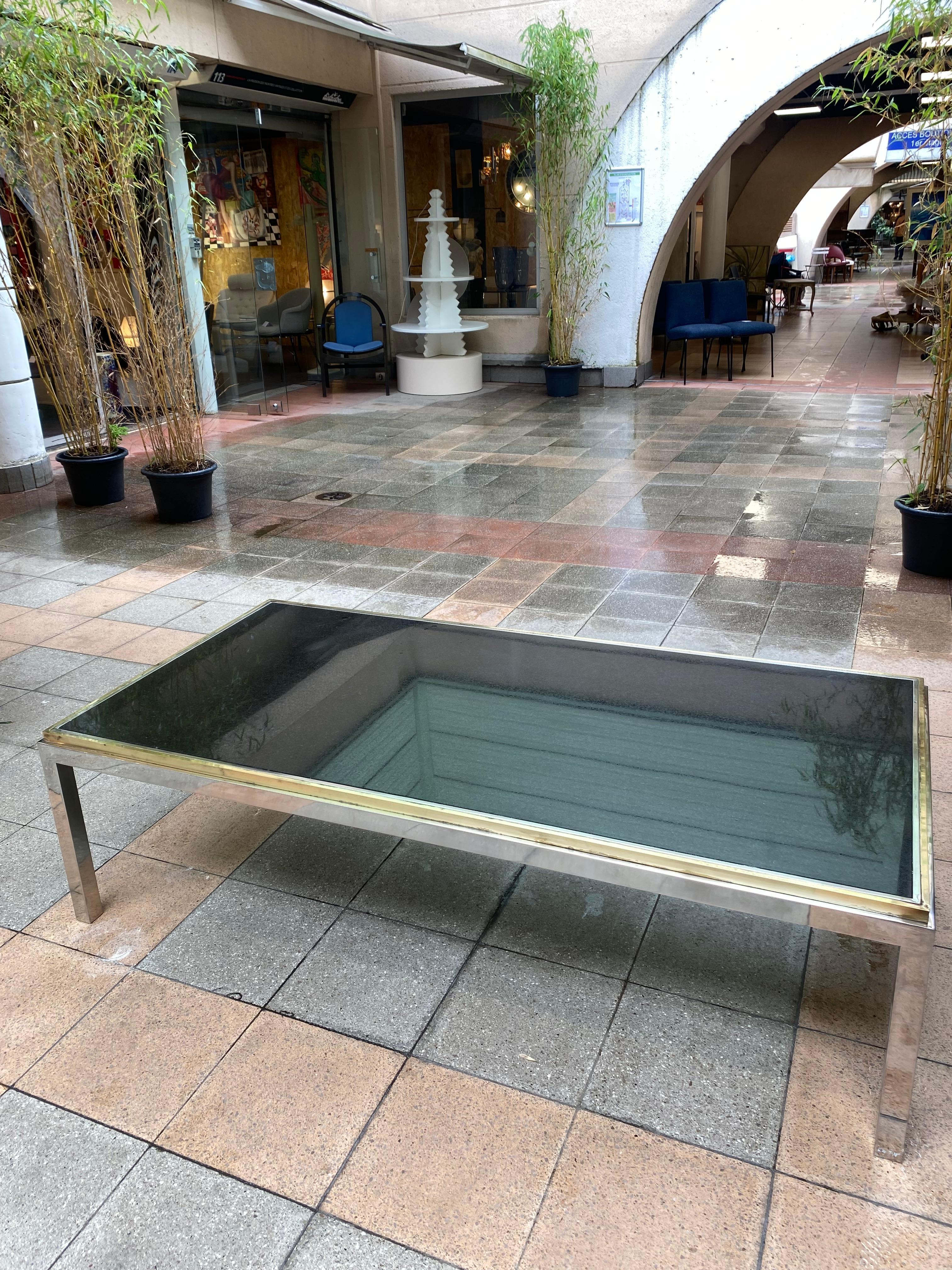 
Table basse Willy Rizzo signée - 1978

Structure en laiton et plaque en granit 
Table signée sur l'un des pieds (la signature est rare sur les meubles de Willy Rizzo)
Largeur 80 x Hauteur 45 x Longueur 160

En très bon état vintage.
