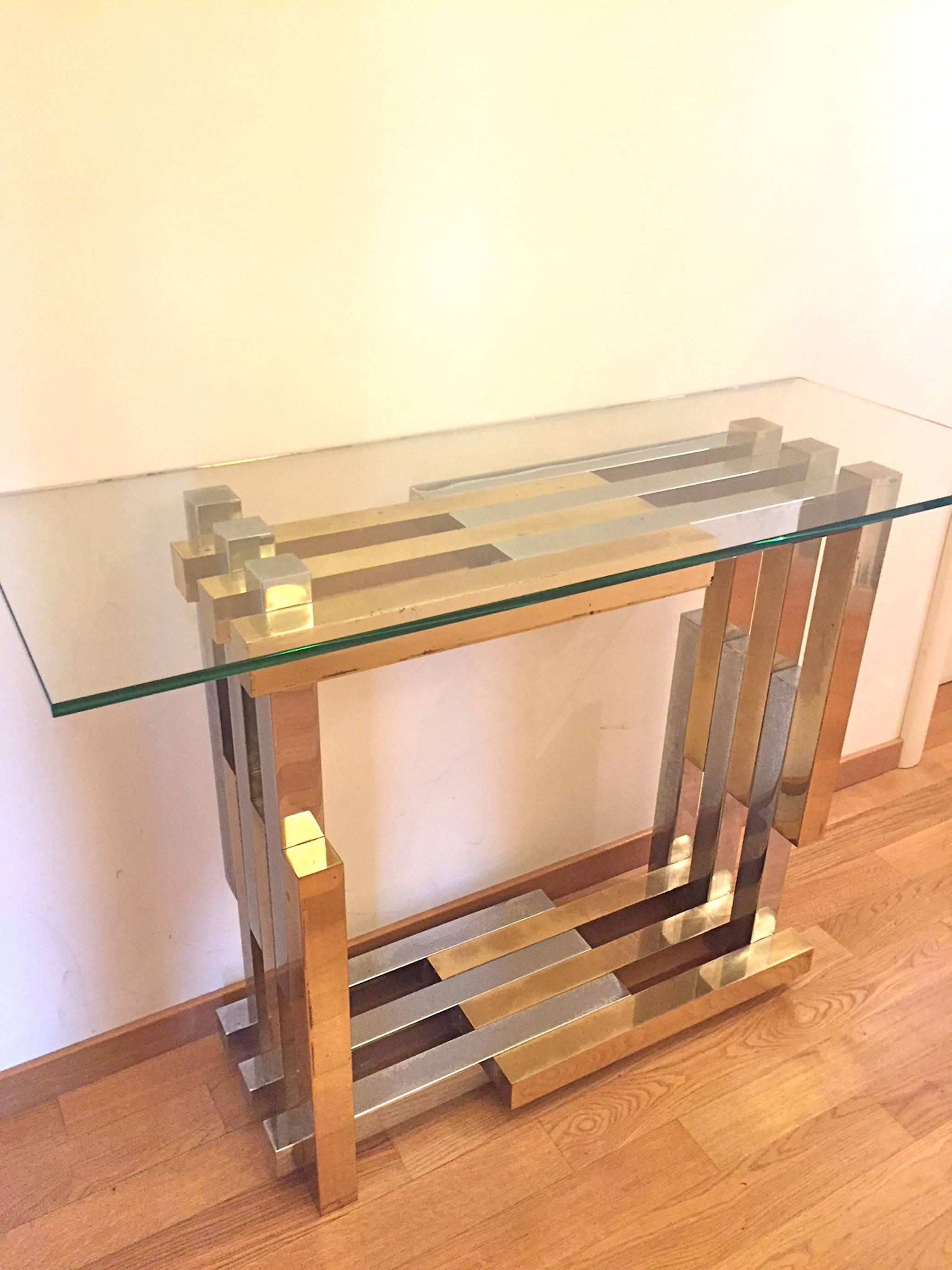 A Willy Rizzo metal and glass console. Glass and metal frame. Optimum condition.
