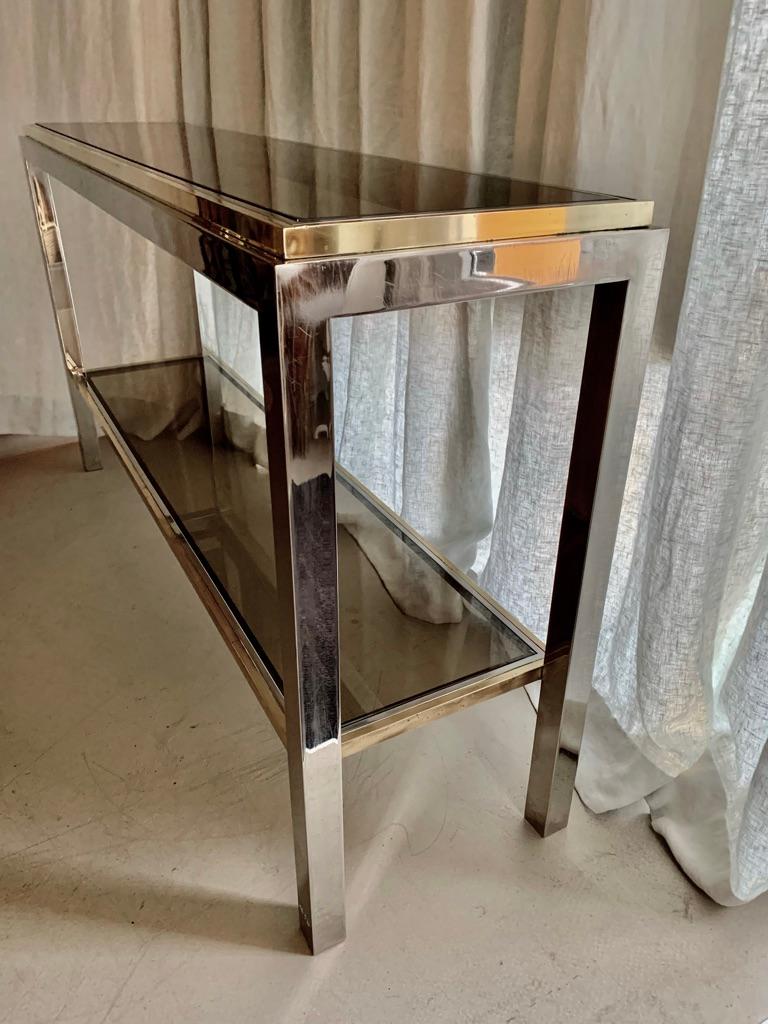 Elegant chrome and brass console named 