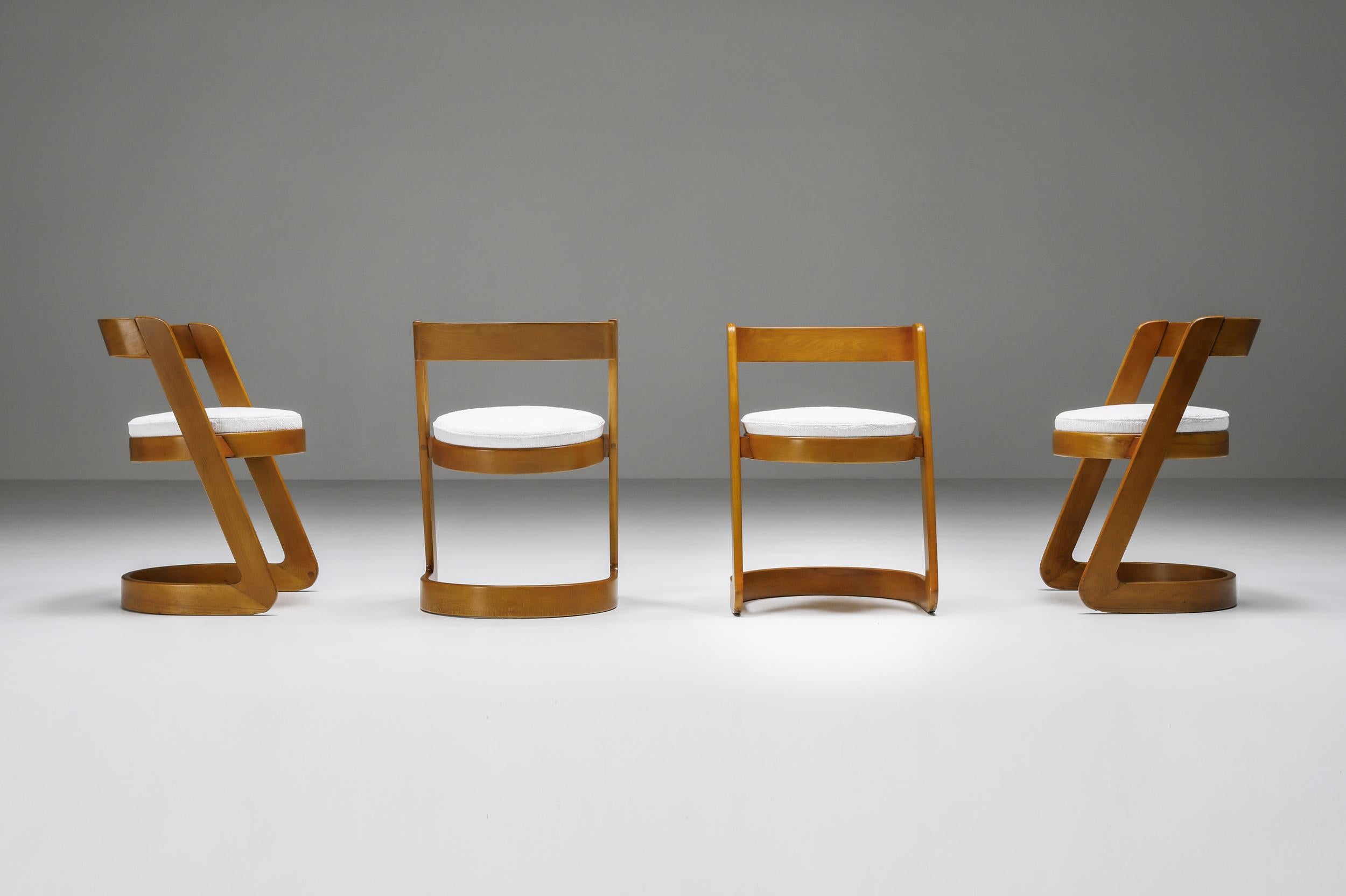 Willy Rizzo dining chairs set by Mario Sabot, Italy - 1970's; Italian Design

Delightful and petit mid-century wooden chair designed by Willy Rizzo for Mario Sabot.

This set of four chairs was produced during the 1970s in Italy. The wood in