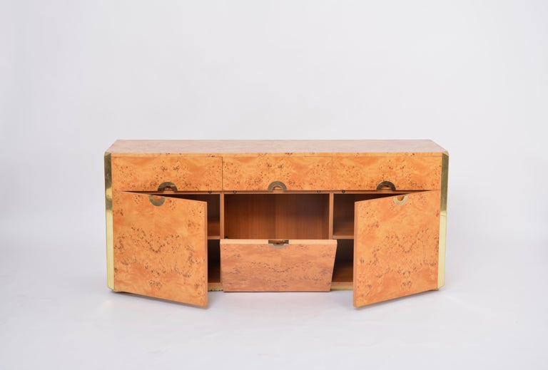 This sideboard / credenza / cabiinet was designed by famous designer and photographer Willy Rizzo in 1972 and is from his 