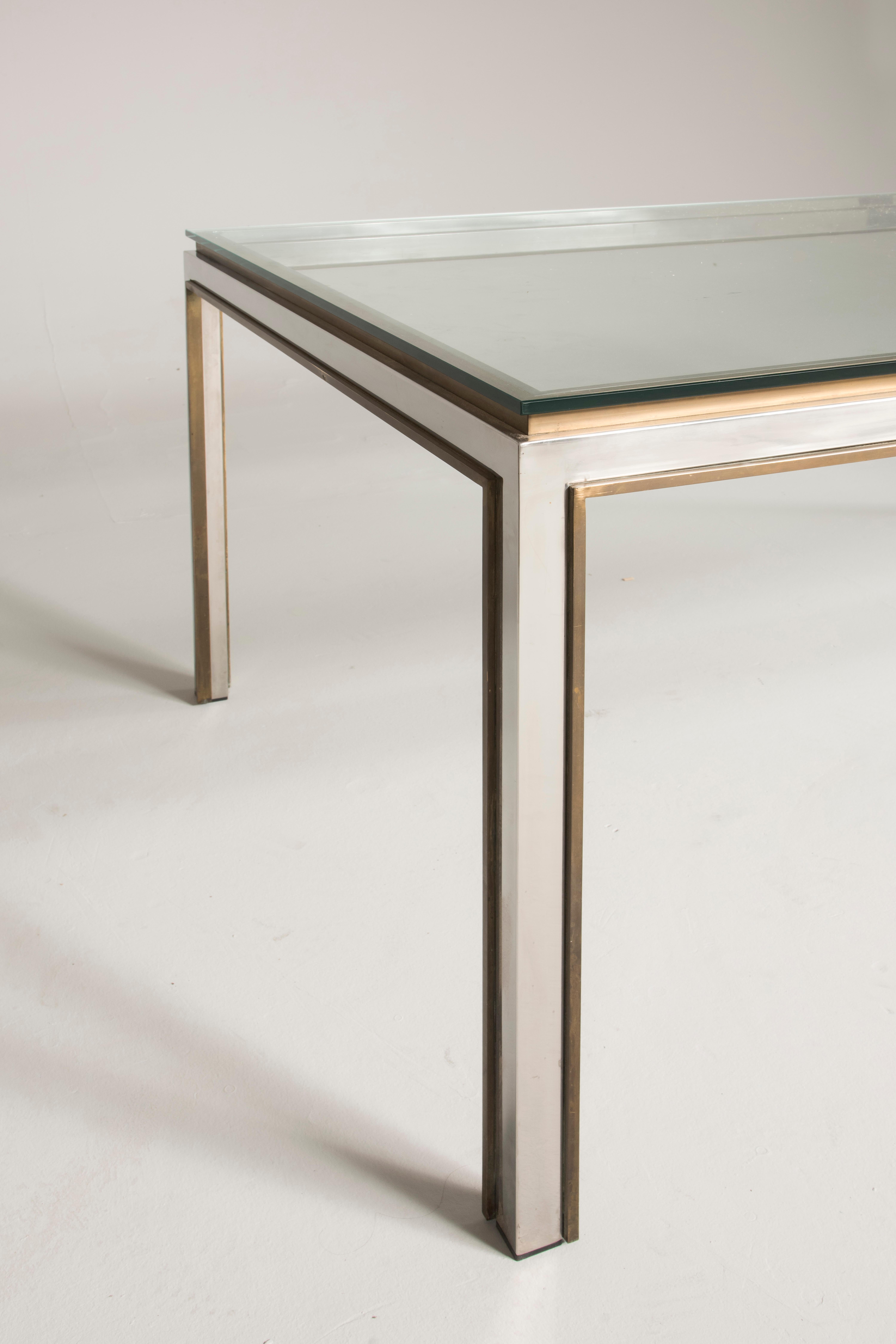 Fiorentina Model table by Willy Rizzo, Italy, 1970s. Steel and brass structure, glass top. Size: 101 x 204 cm, H 75 cm. A video is available upon request. Good conditions, wears coherent with age and prior use. No restoration needed. 

 Willy