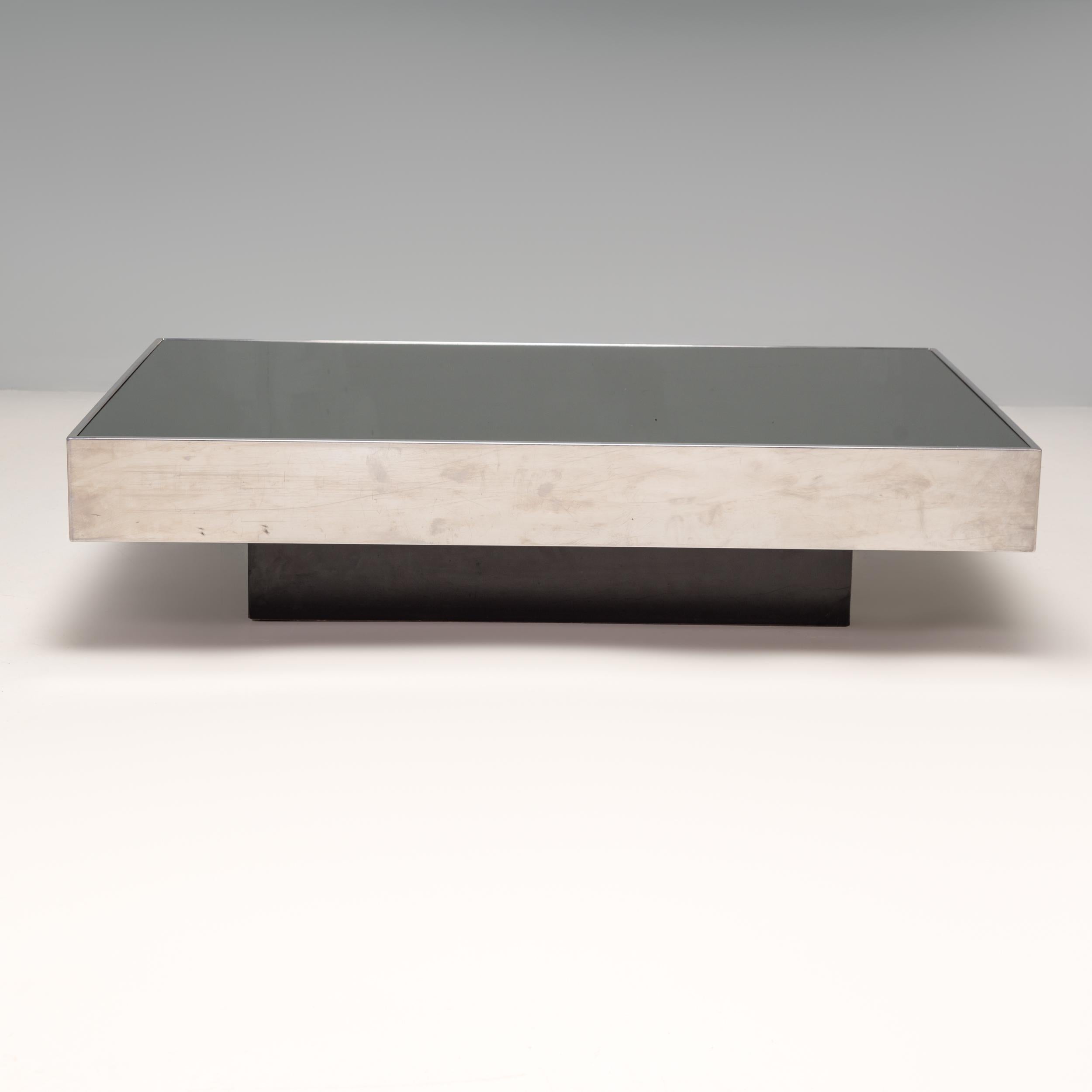 Designed by Willy Rizzo and manufactured by Cidue, this coffee table is a fantastic example of 1970s Italian design.

Rizzo was a photographer who designed furniture for his own home and friends before starting to have his designs manufactured for