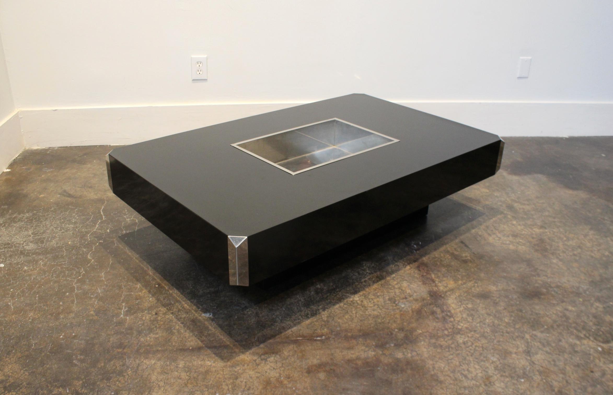 Black laminate and chromed steel coffee table designed by Willy Rizzo and manufactured by Mario Sabot in Italy in 1972. Corners highlighted in chromed steel. Steel basin in the middle can be used as an ice bucket or planter.